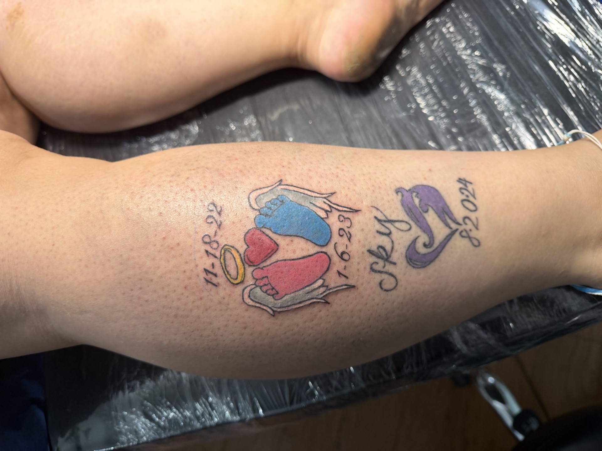 Color + Illustrative baby feet tattoo on Calf by Apex_Effort_Studio on TattMe