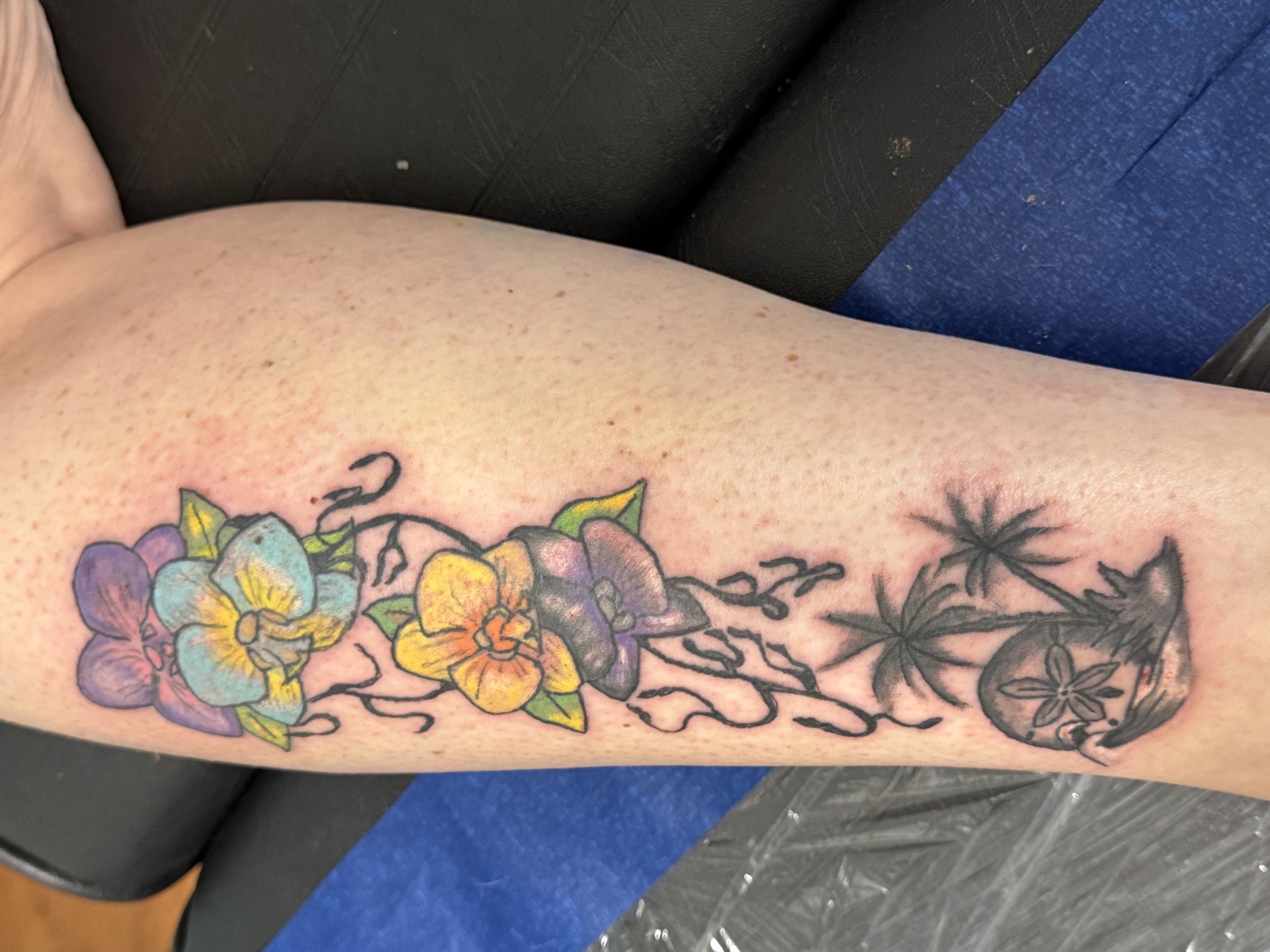 Color + Black & Grey flowers tattoo on Calf by Apex_Effort_Studio on TattMe