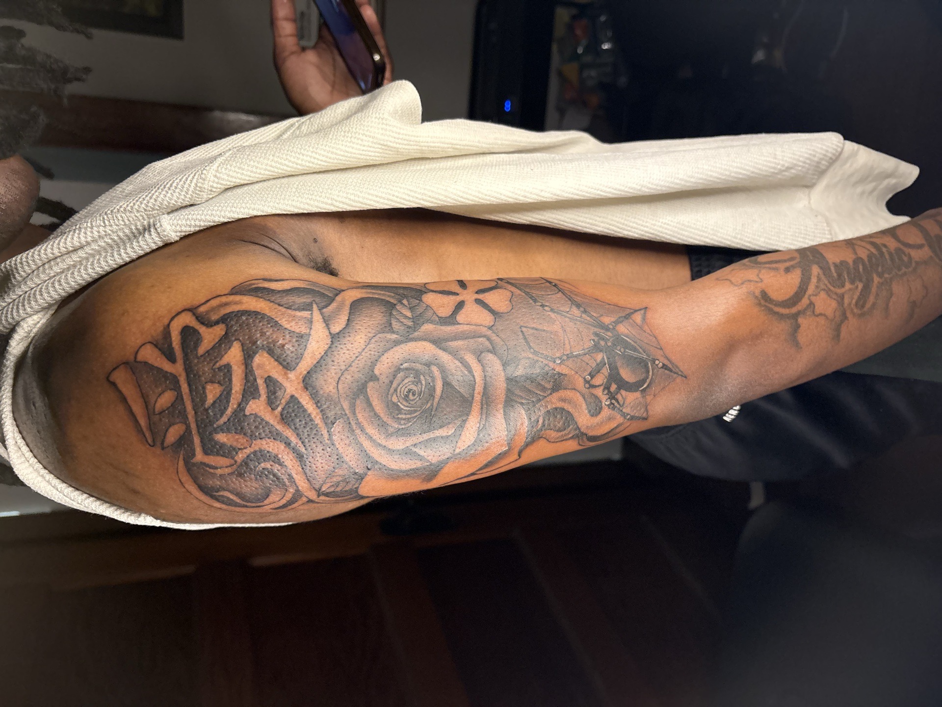 Black & Grey + Lettering rose tattoo on Half Sleeve by MaleekInkz on TattMe