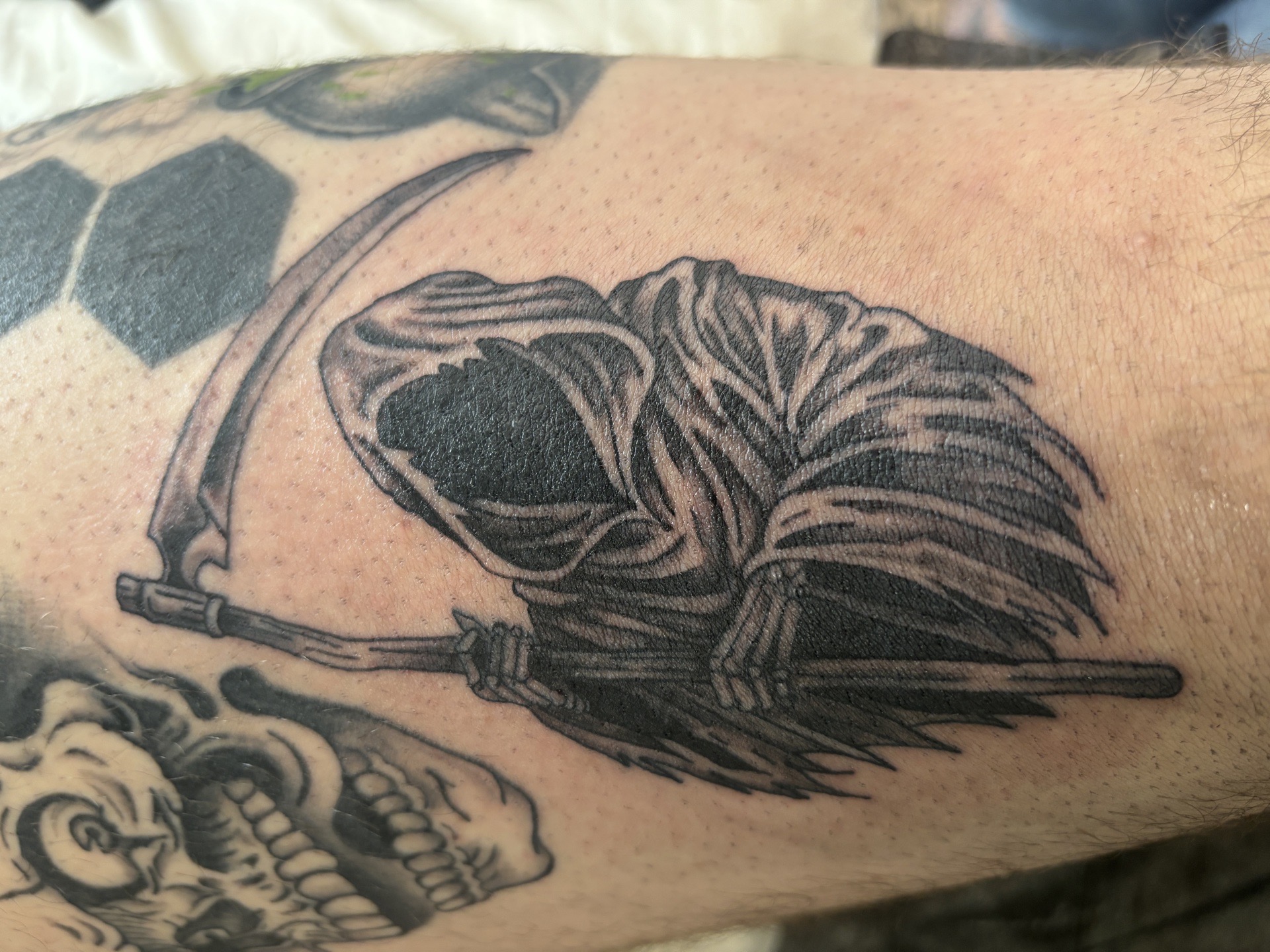 Black & Grey + Illustrative grim reaper tattoo on Forearm by Skull_Brothers_Ink on TattMe