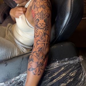 Black & Grey + Illustrative leopard tattoo on Half Sleeve by 6hosted on TattMe
