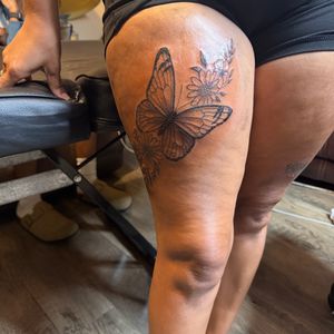 Floral + Line-work butterfly tattoo on Thigh by 6hosted on TattMe