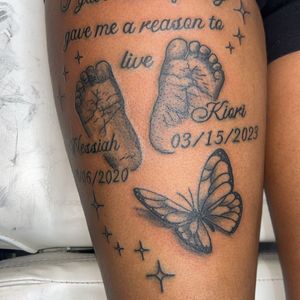 Lettering + Script footprints tattoo on Thigh by Mo_Money_Tatts on TattMe
