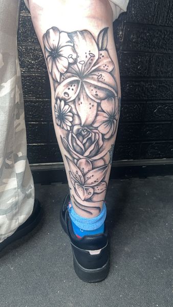 Floral + Black & Grey flowers tattoo on Calf by Mo_Money_Tatts on TattMe
