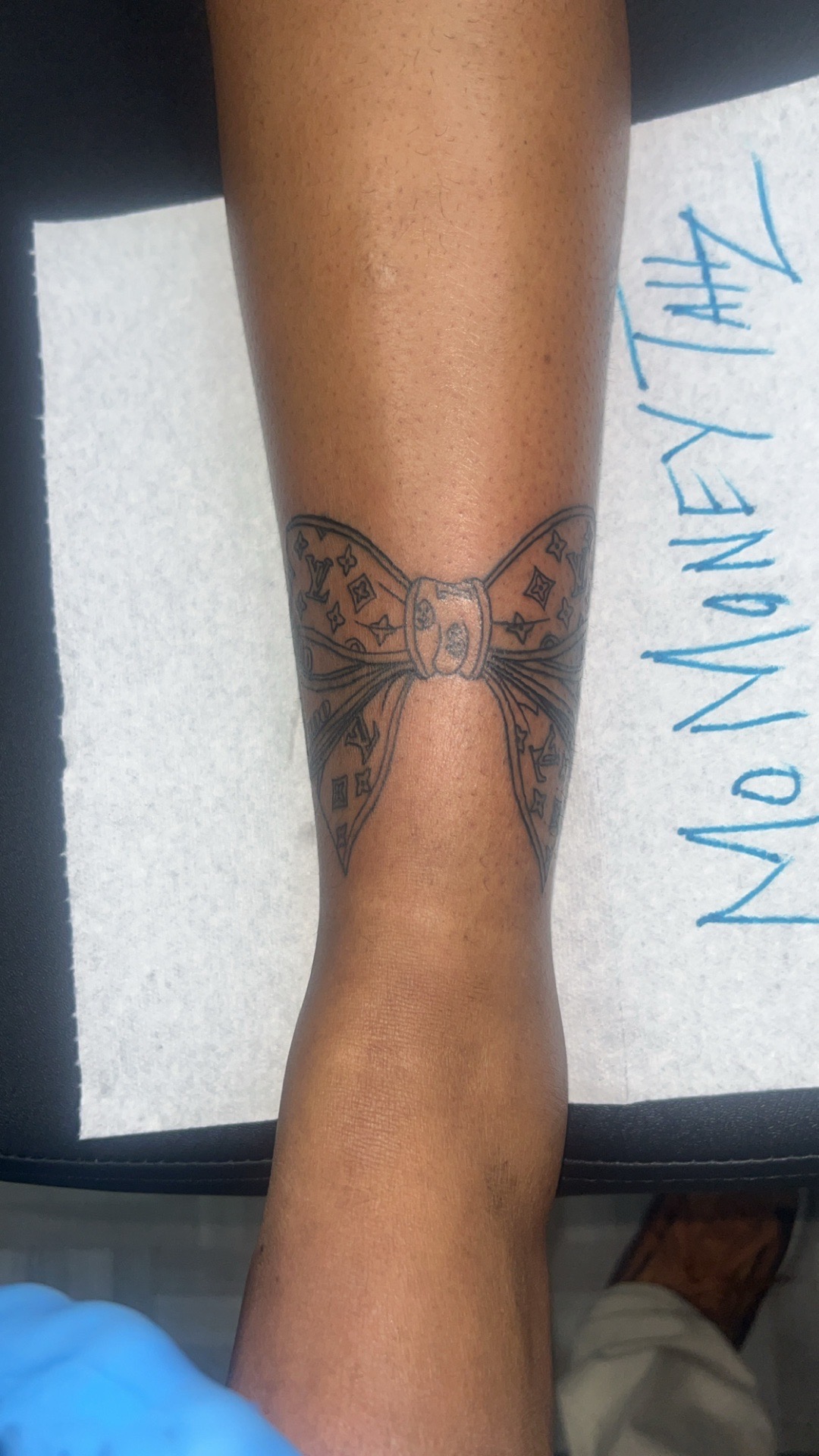 Fine Line + Illustrative bow tattoo on Calf by Mo_Money_Tatts on TattMe