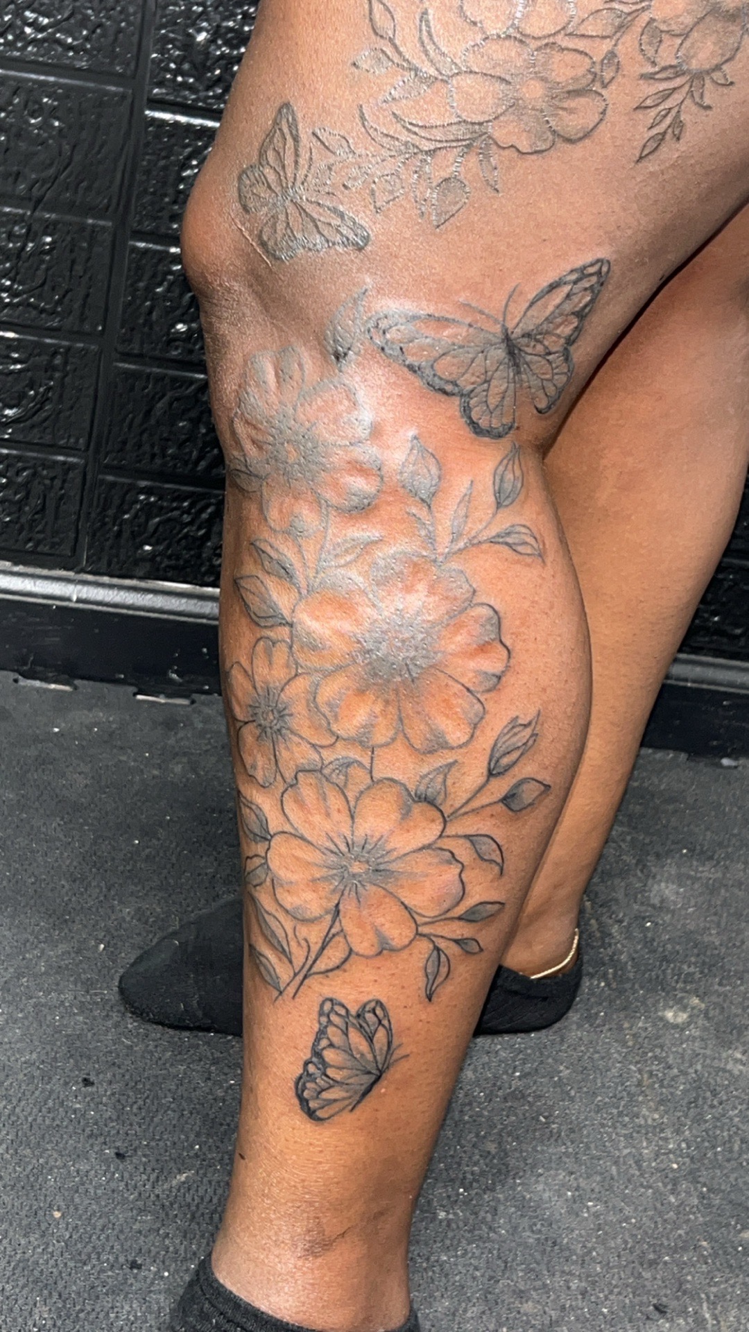 Floral + Fine Line flowers tattoo on Calf by Mo_Money_Tatts on TattMe