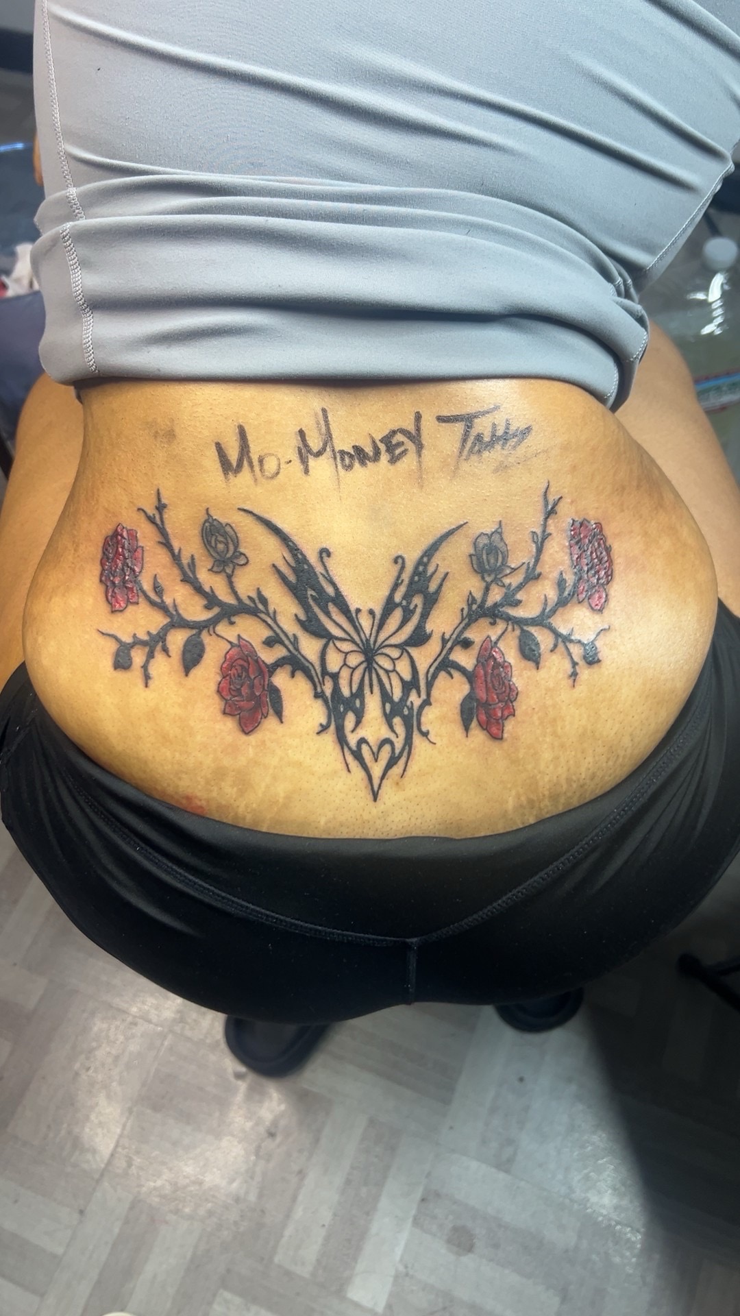 Black-work + Floral butterfly tattoo on Lower Back by Mo_Money_Tatts on TattMe
