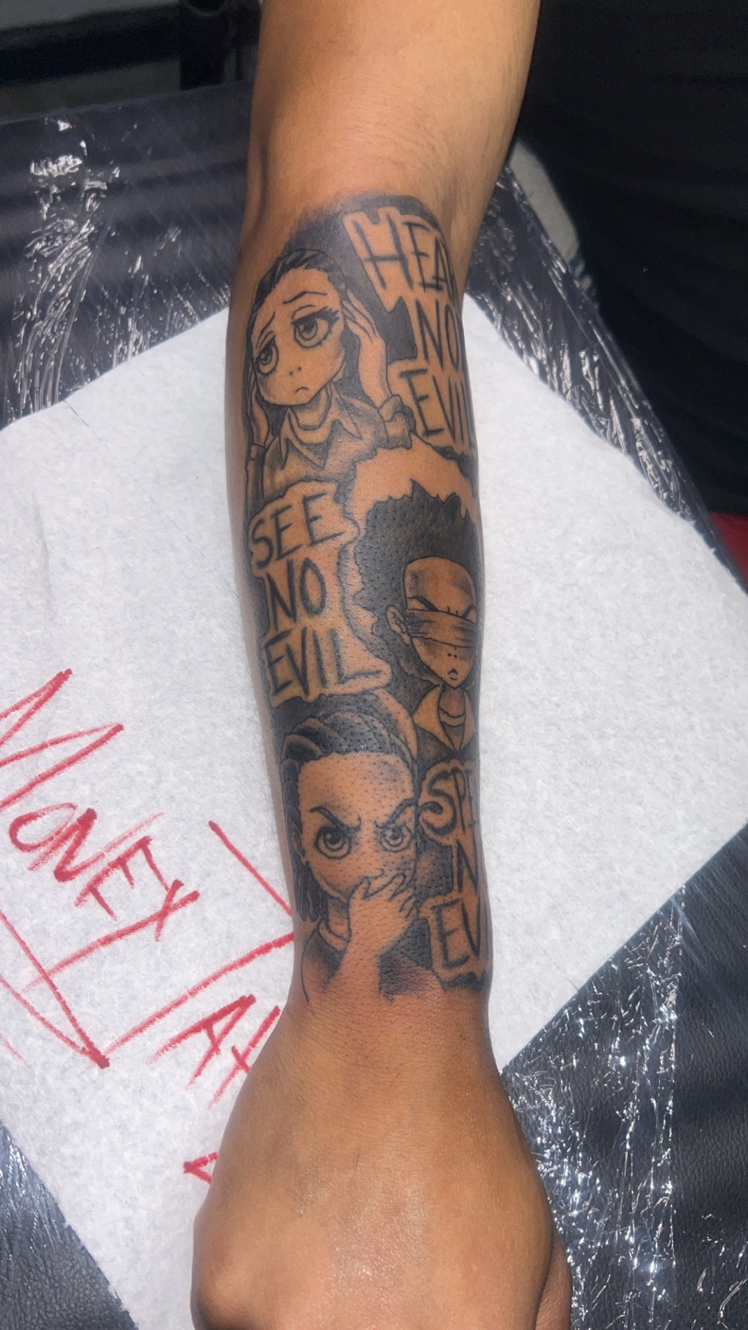 Black & Grey + Illustrative characters tattoo on Forearm by Mo_Money_Tatts on TattMe