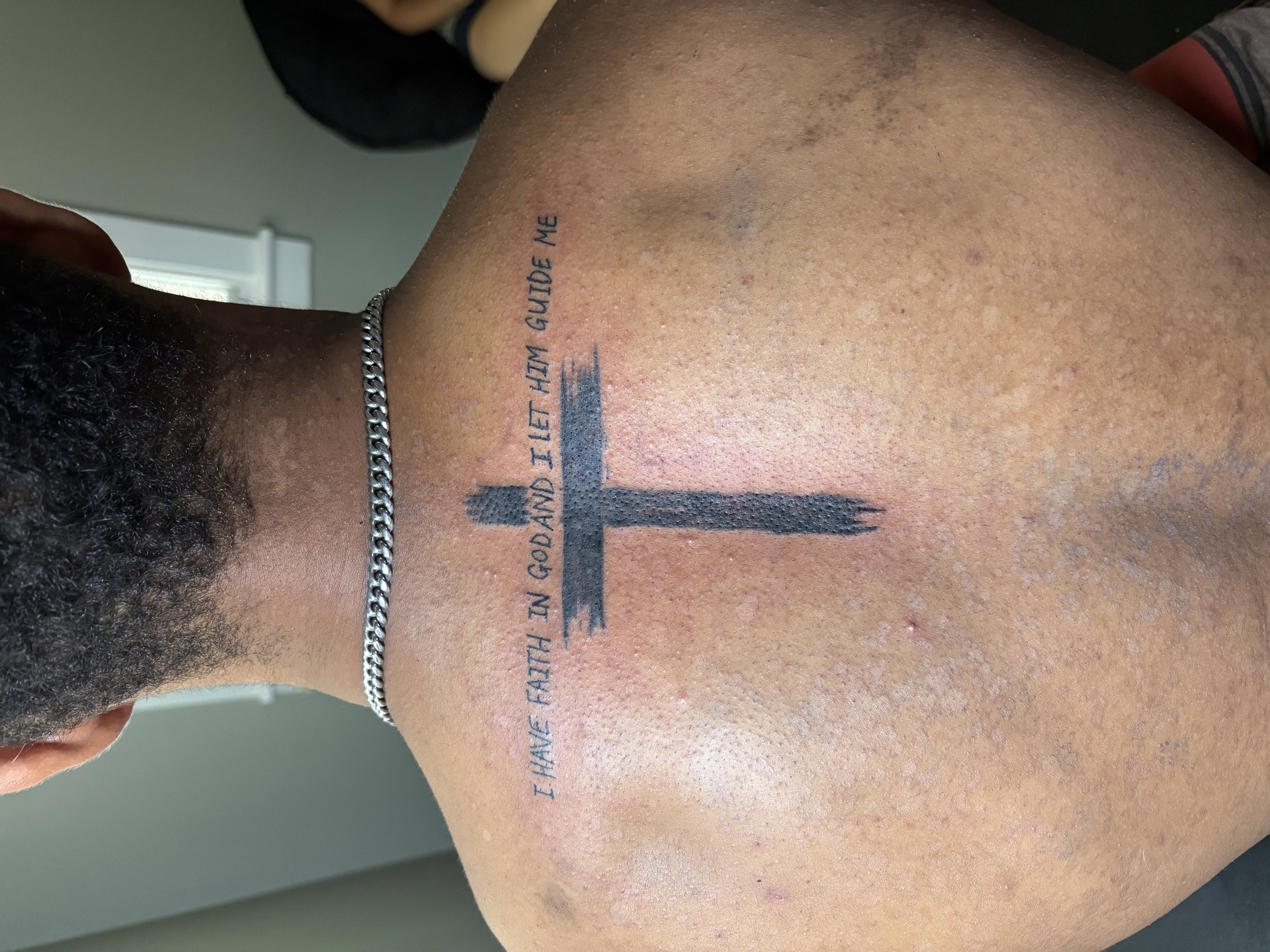 Black-work + Lettering cross tattoo on Upper Back by TattedbyJayden on TattMe