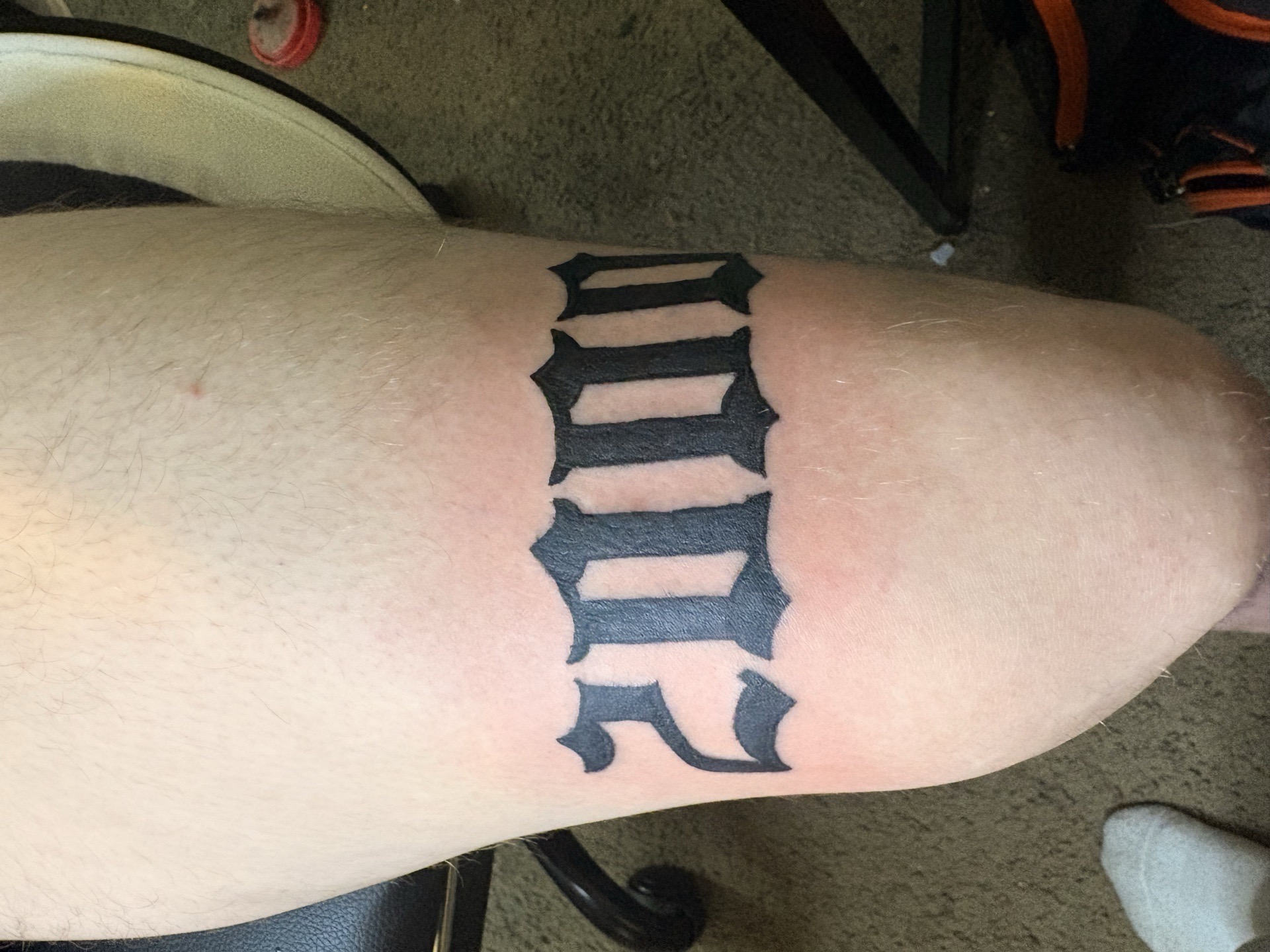 Lettering + Black-work numbers tattoo on Thigh by TattsByBoogzz on TattMe