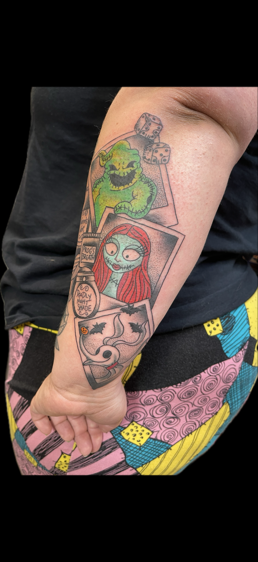 Color + Illustrative oogie boogie tattoo on Forearm by Carmela_Bella on TattMe