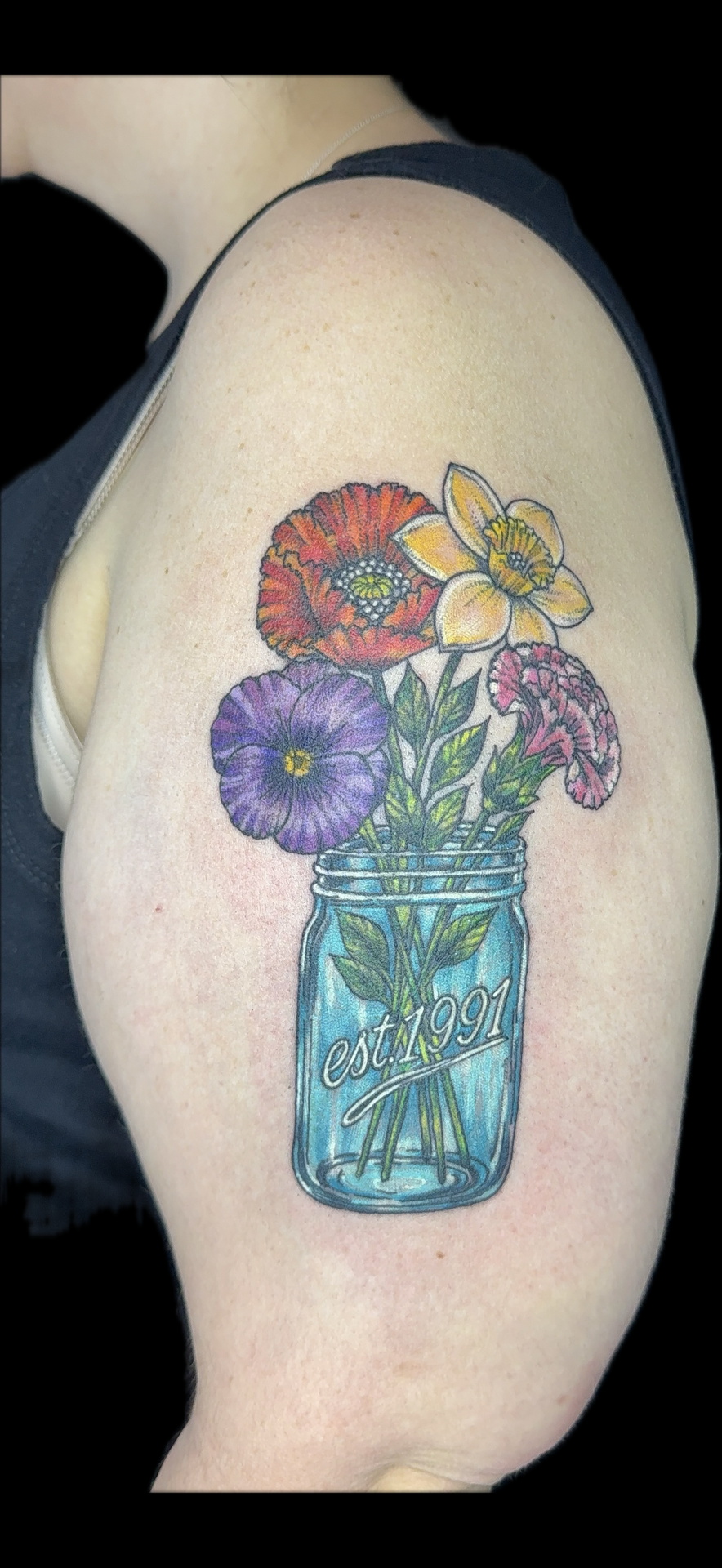 Color + Illustrative flowers tattoo on Upper Arm by Carmela_Bella on TattMe