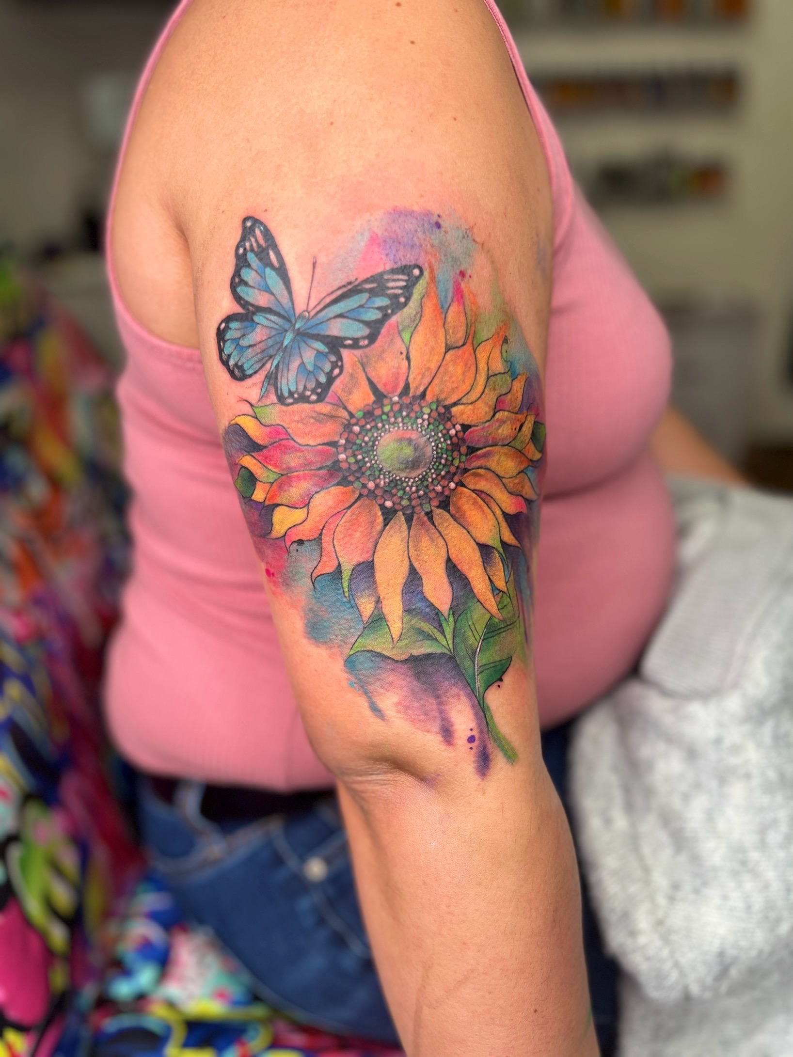Watercolor + Color sunflower tattoo on Upper Arm by Marvelous_Millzy on TattMe
