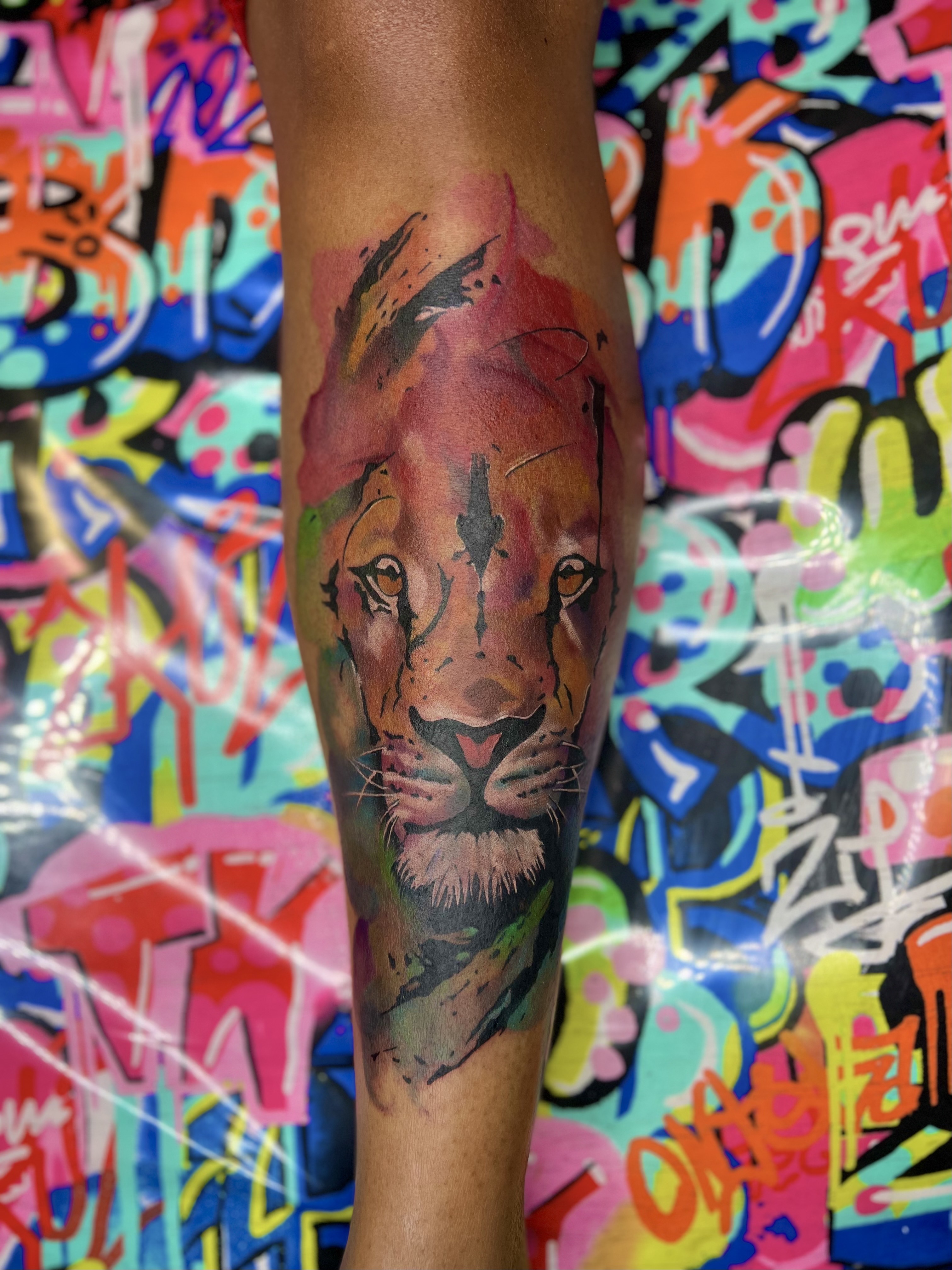 Watercolor + Color lion tattoo on Calf by Marvelous_Millzy on TattMe