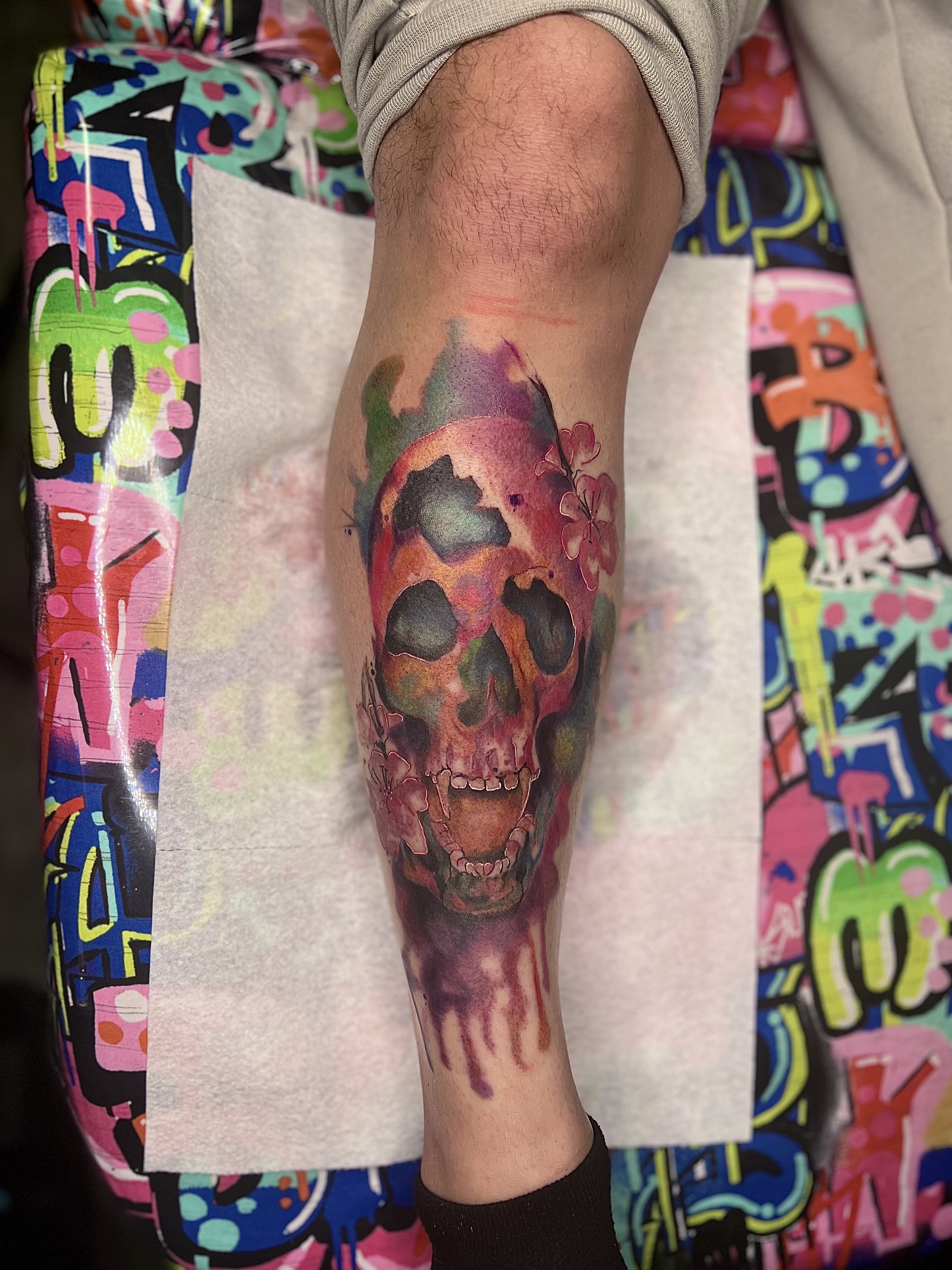 Color + Watercolor skull tattoo on Calf by Marvelous_Millzy on TattMe