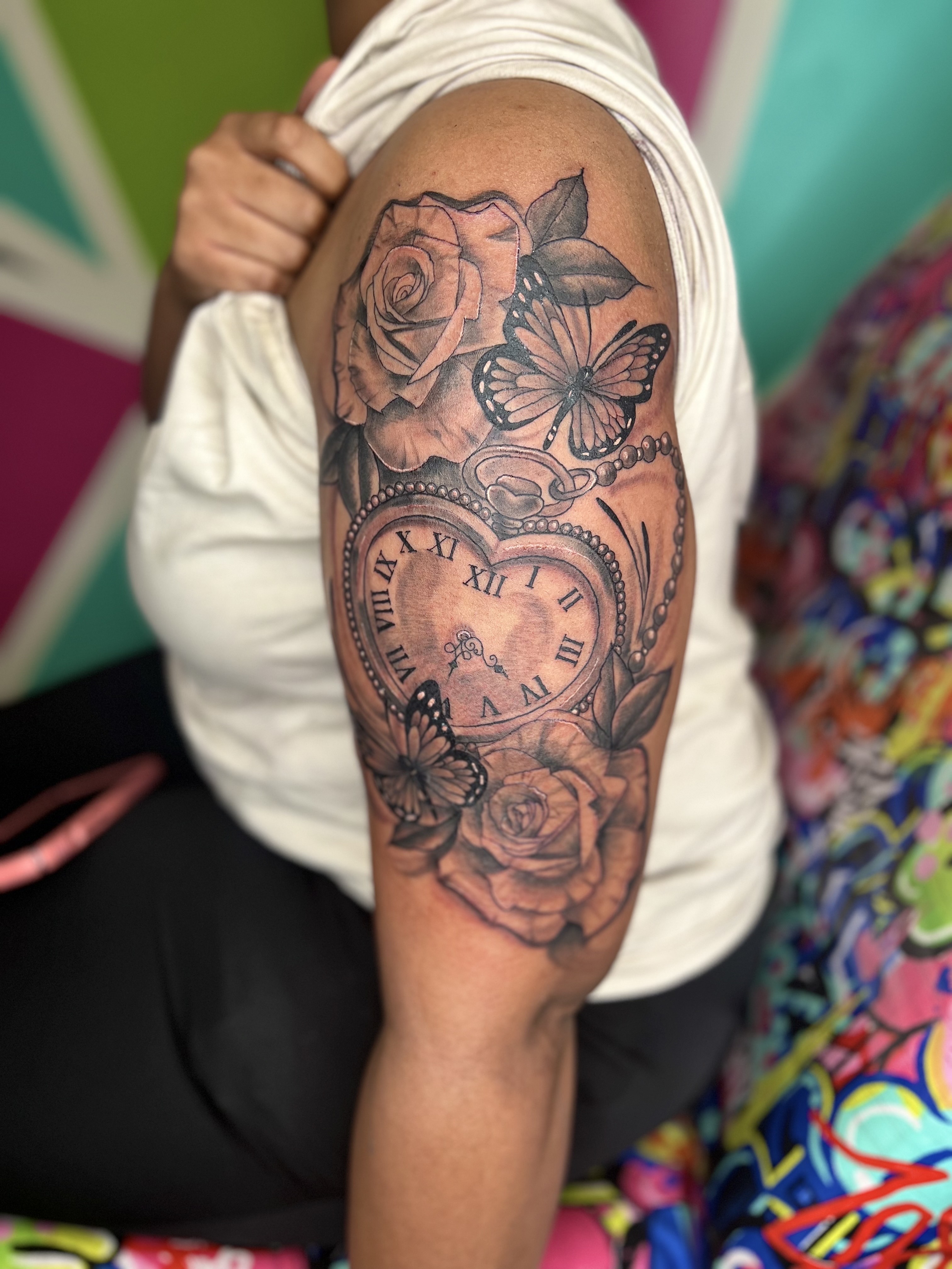 Black & Grey + Illustrative roses tattoo on Upper Arm by Marvelous_Millzy on TattMe
