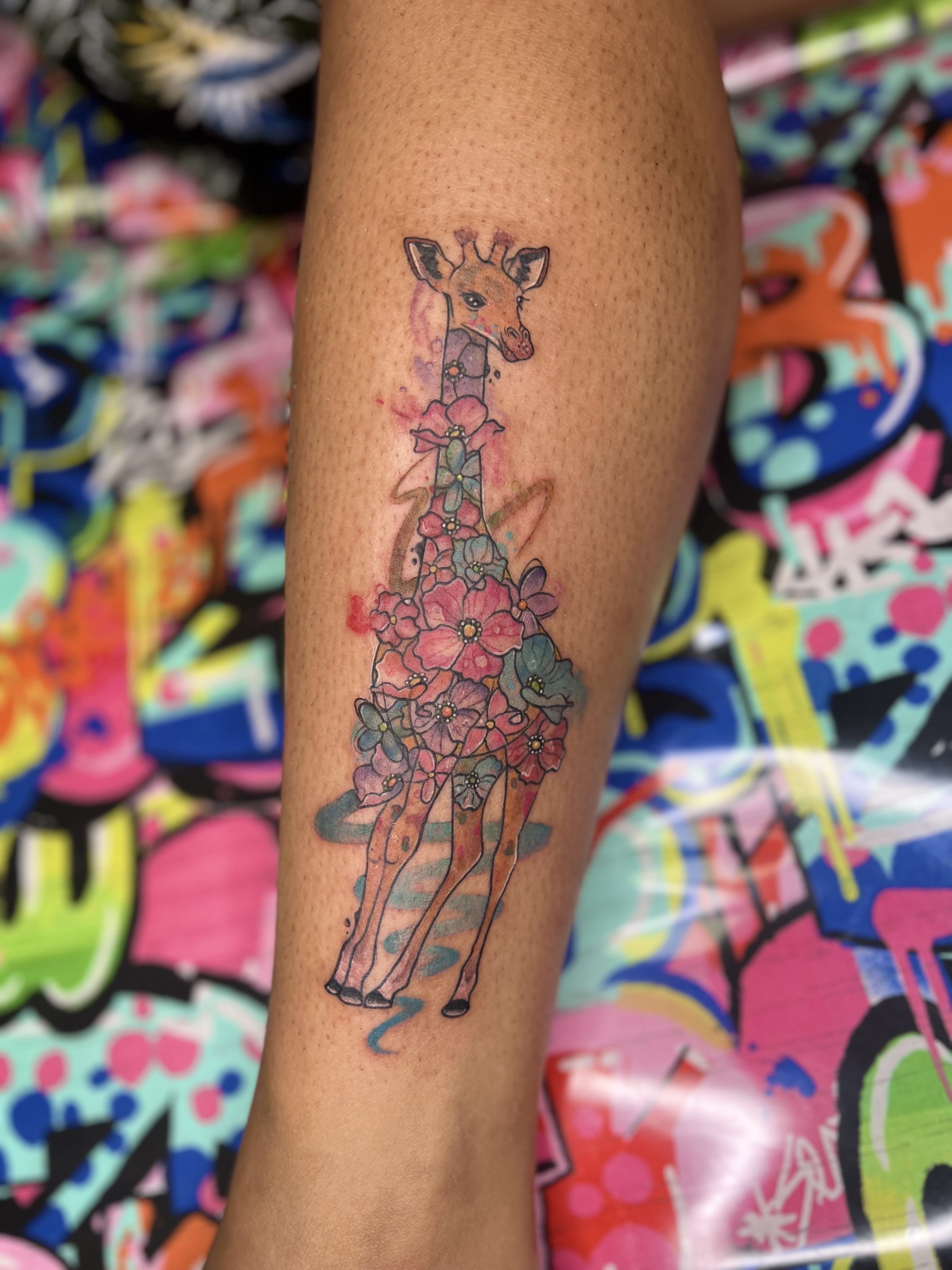 Illustrative + Floral giraffe tattoo on Calf by Marvelous_Millzy on TattMe