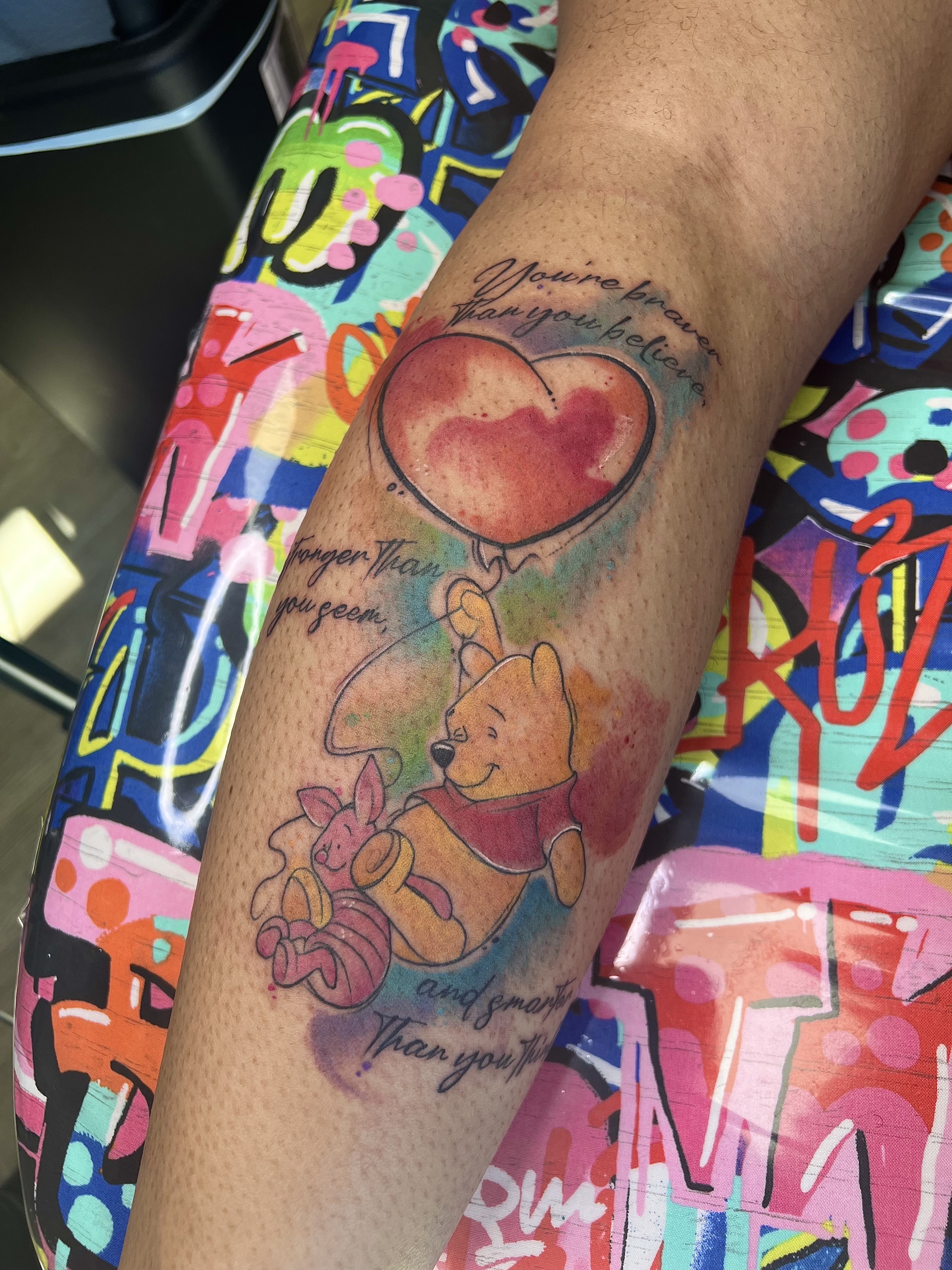 Watercolor + Cartoon winnie the pooh tattoo on Calf by Marvelous_Millzy on TattMe
