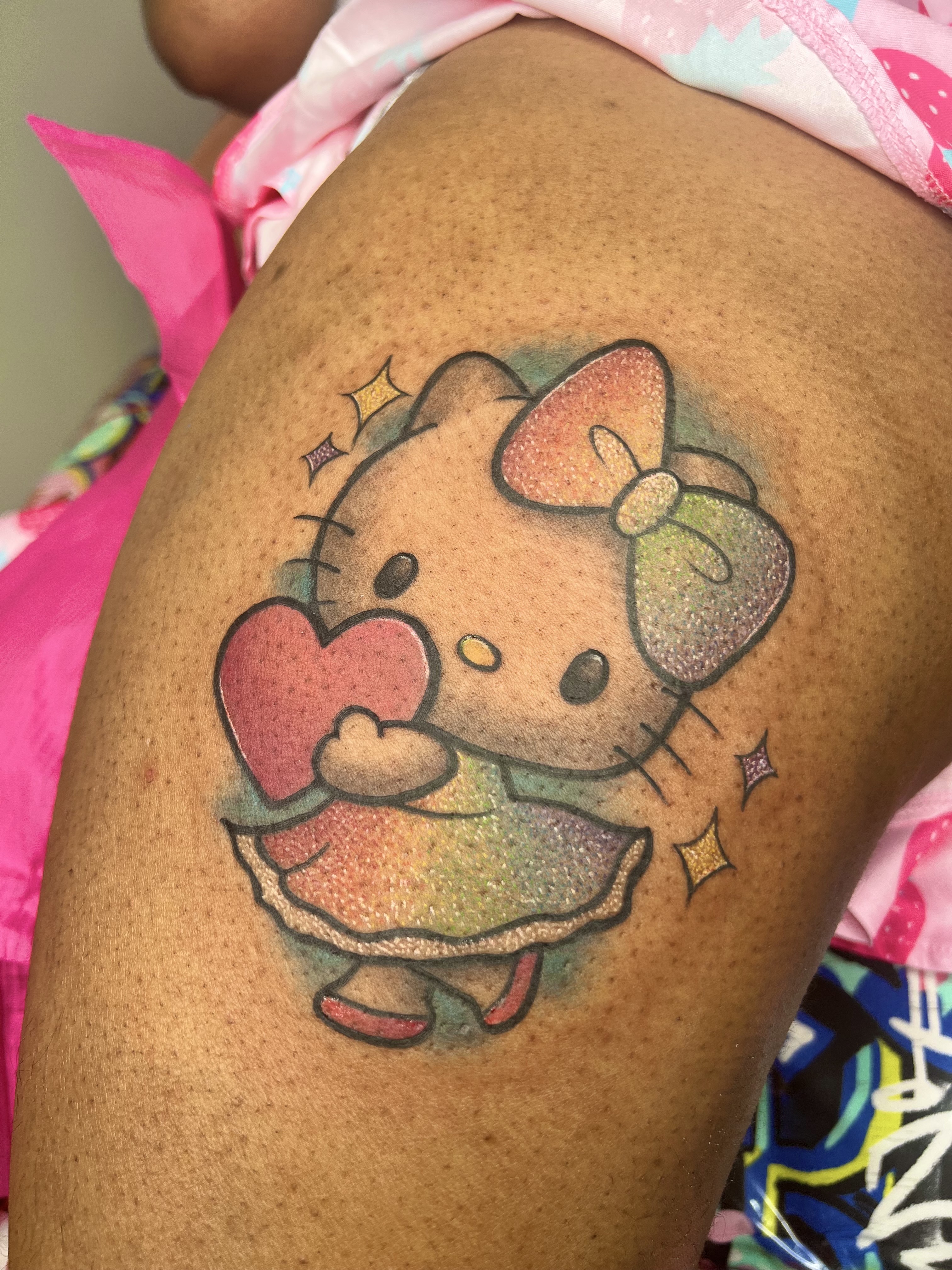 Color + Cartoon hello kitty tattoo on Thigh by Marvelous_Millzy on TattMe