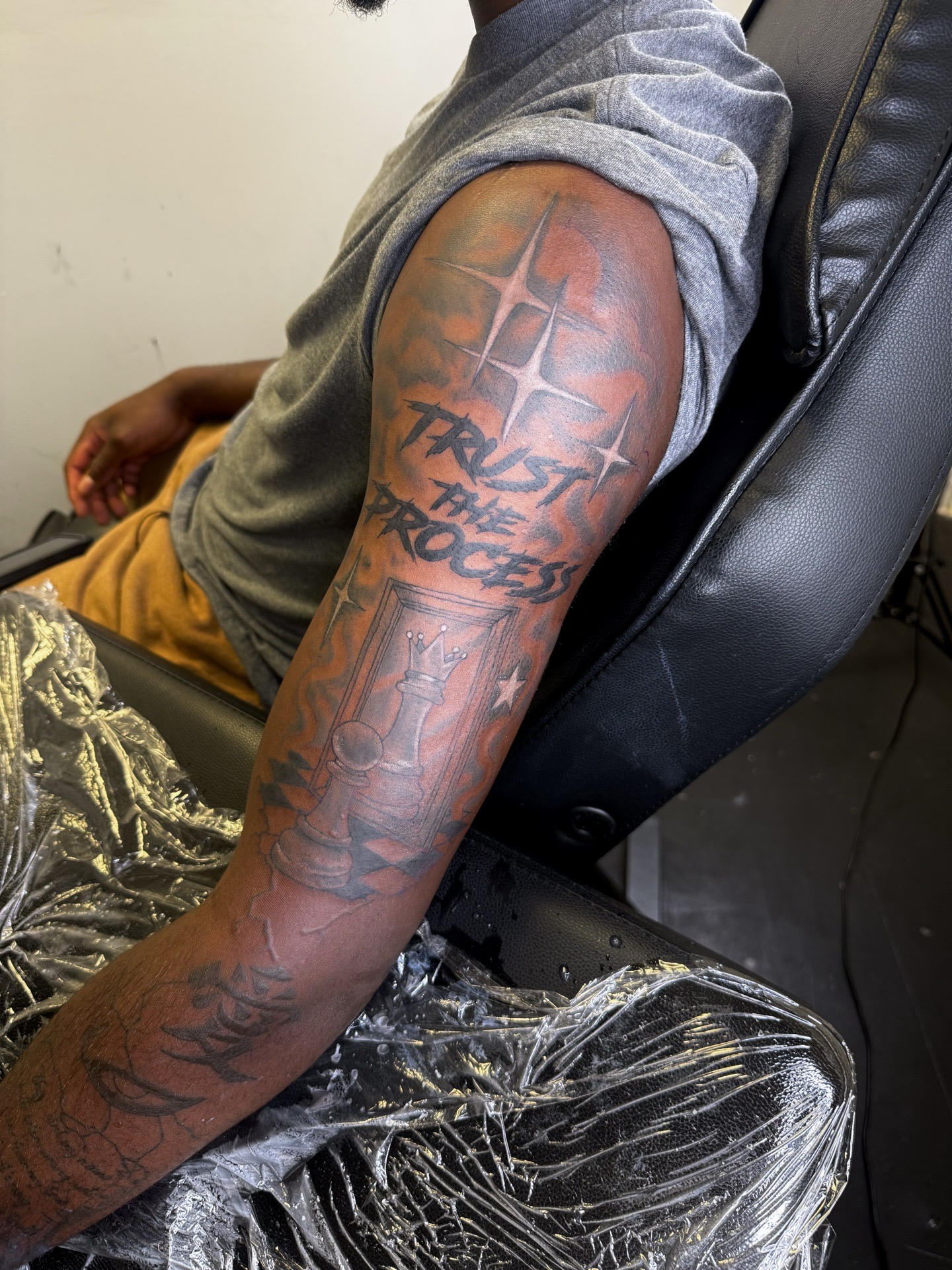 Black & Grey + Lettering text tattoo on Half Sleeve by JST on TattMe