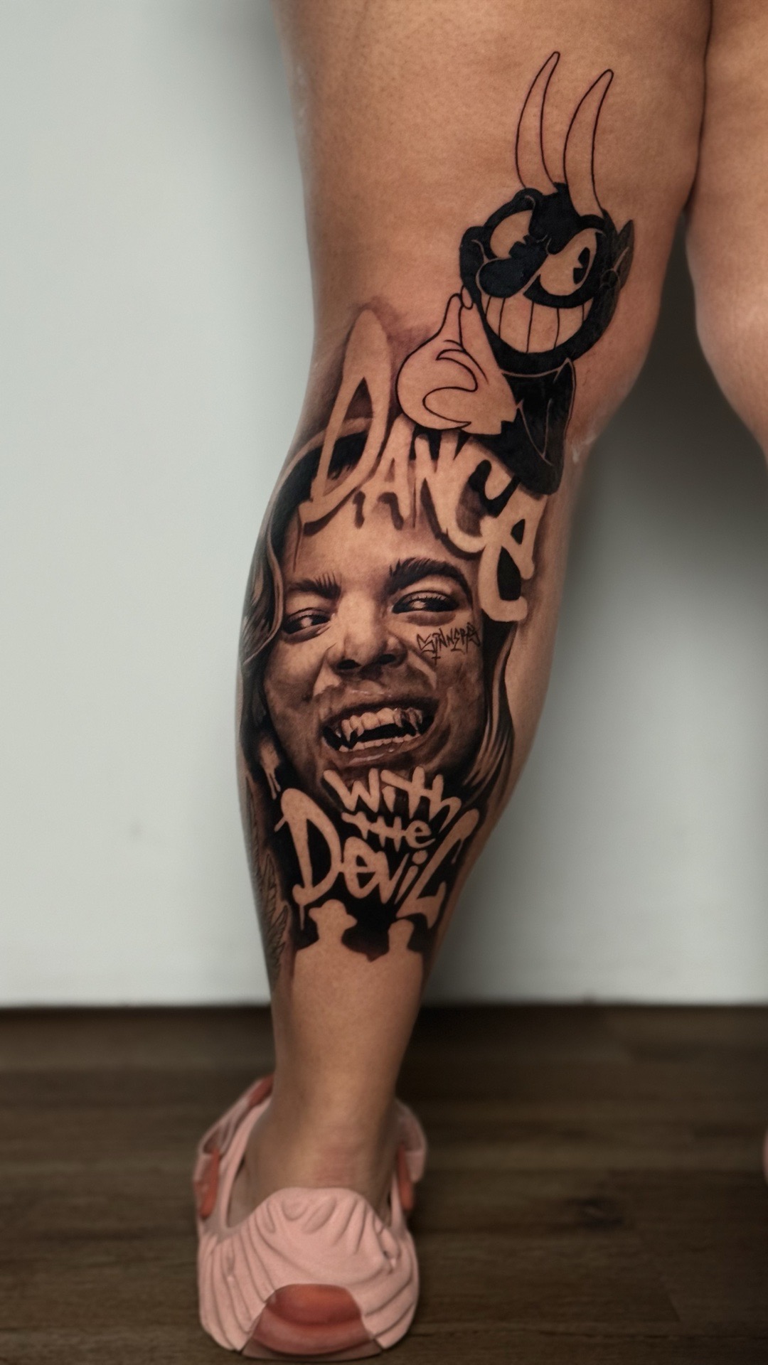 Black & Grey + Realism cartoon devil tattoo on Calf by Randy_SaVaage on TattMe