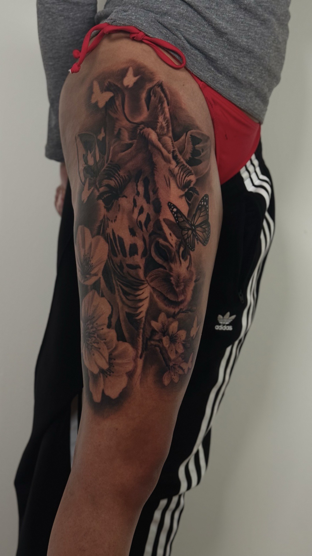 Realism + Black & Grey giraffe tattoo on Thigh by Randy_SaVaage on TattMe