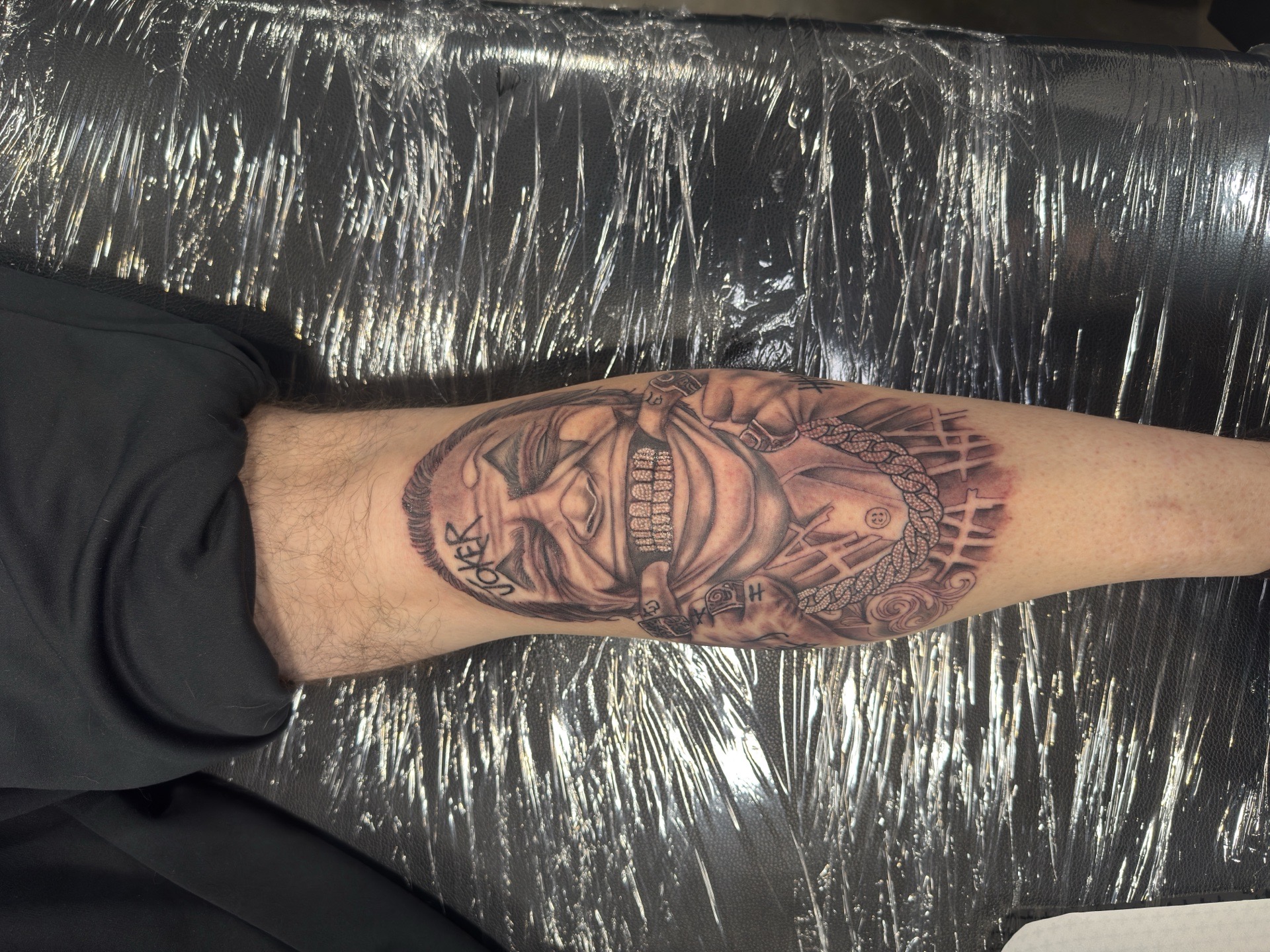 Chicano + Black & Grey joker tattoo on Calf by Ink_Junkie on TattMe