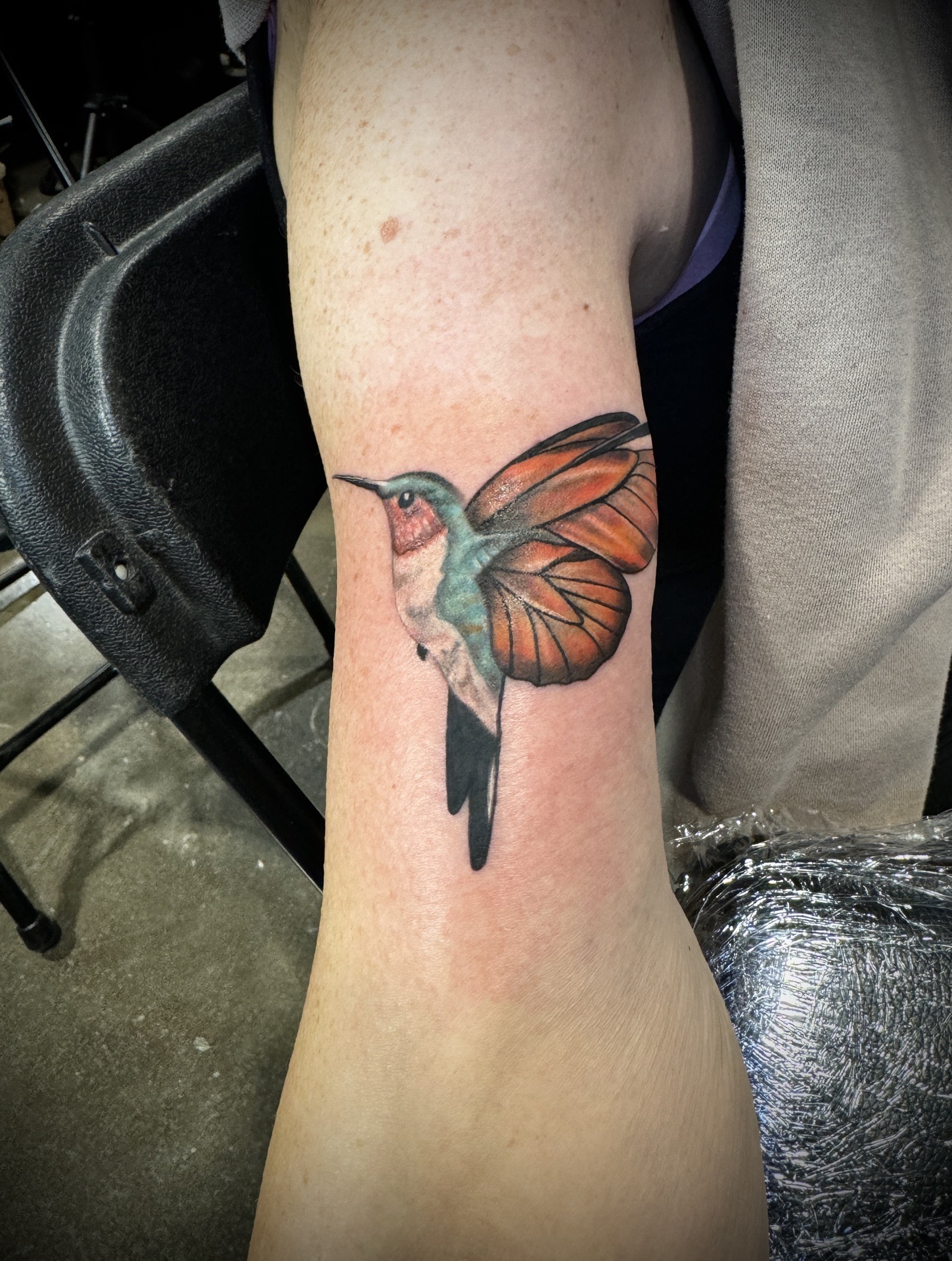 Color + Neo-Traditional hummingbird tattoo on Upper Arm by Ink_Junkie on TattMe