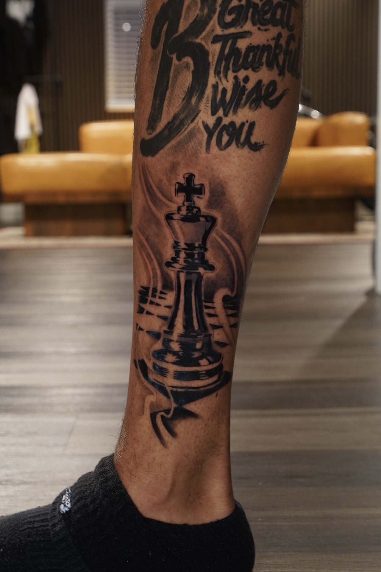 Black & Grey + Lettering chess king tattoo on Calf by Erica on TattMe