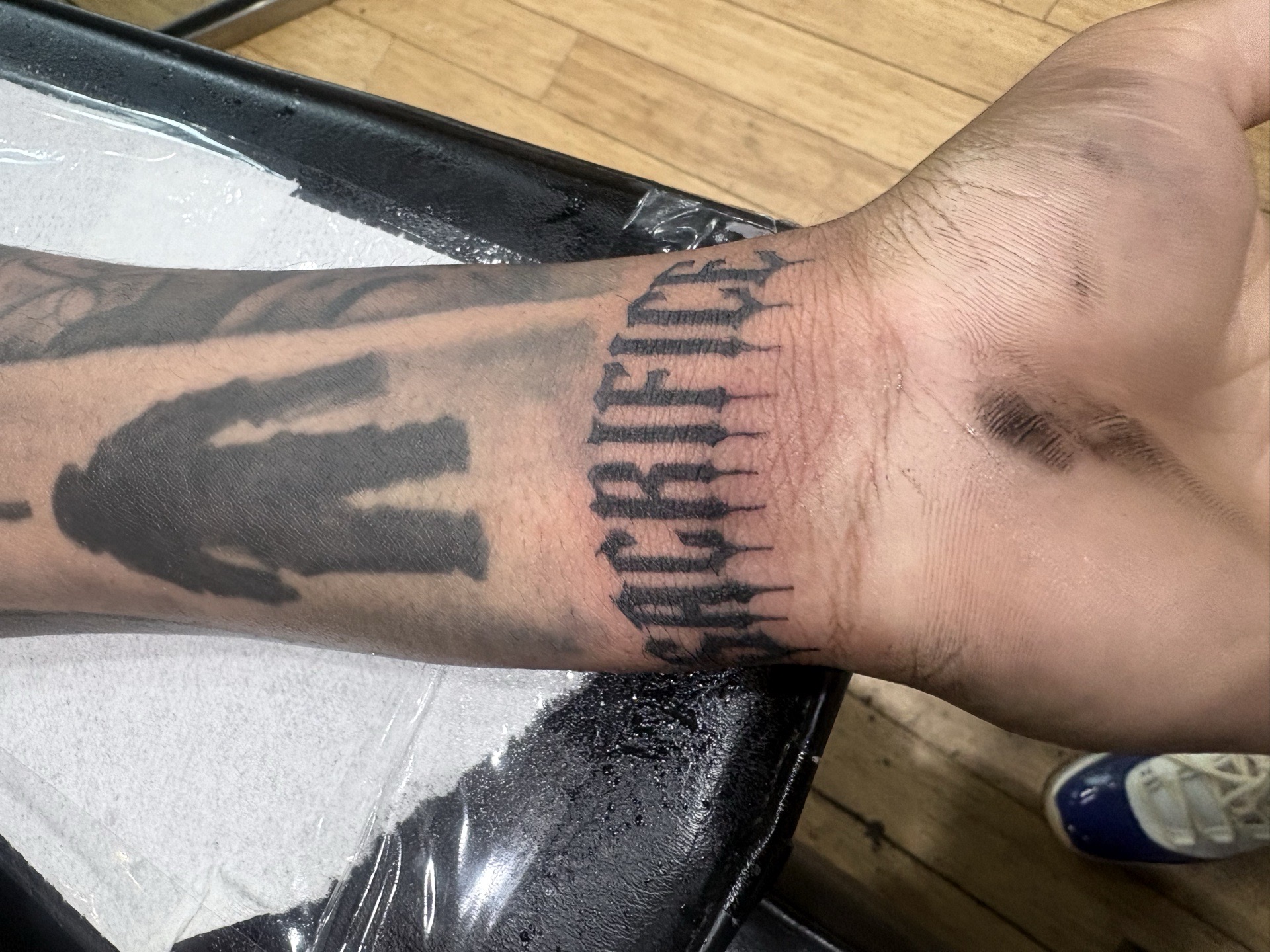 Lettering + Black-work sacrifice tattoo on Wrist by Vo_The_Drug on TattMe