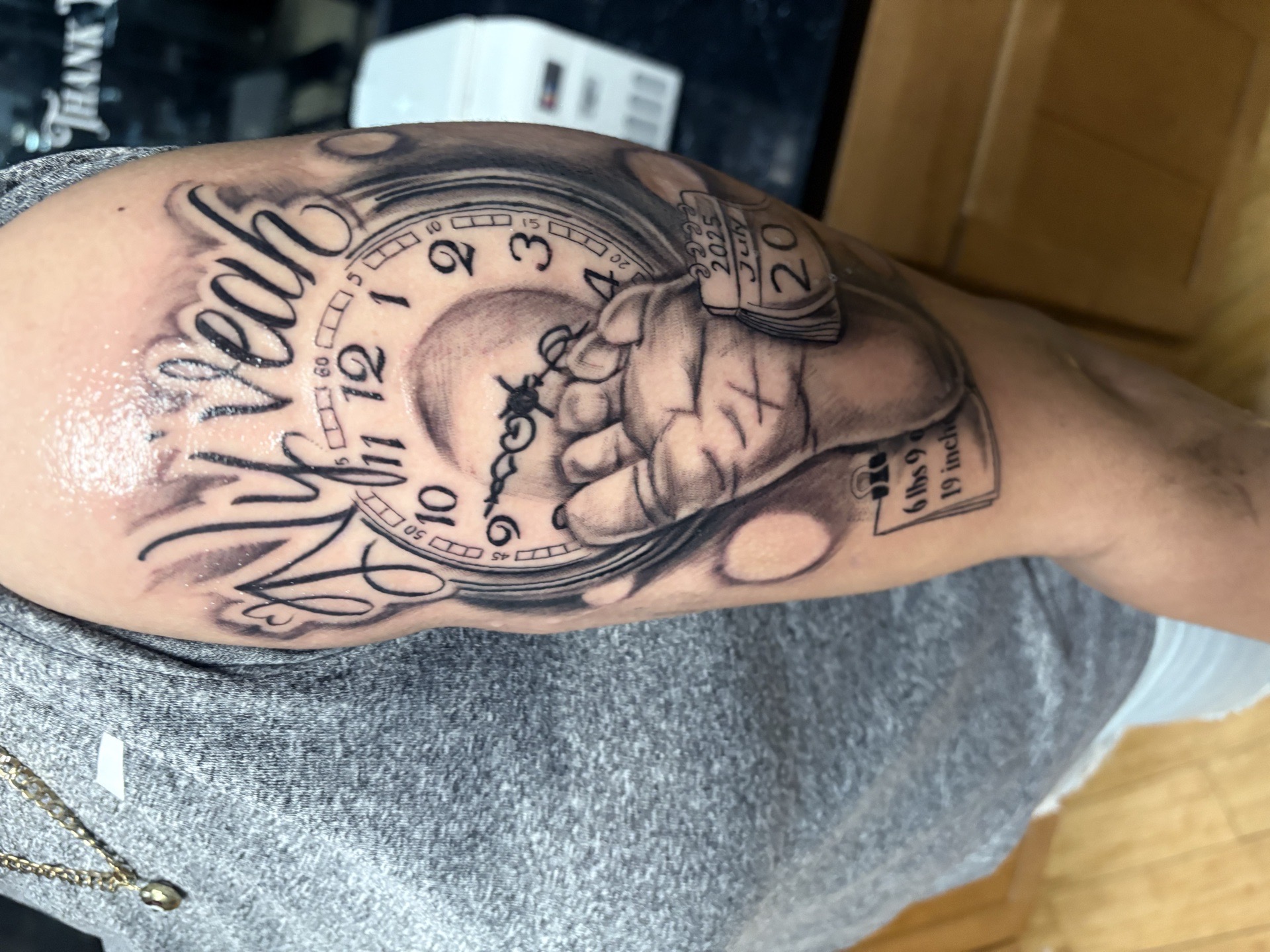 Black & Grey + Lettering baby foot tattoo on Upper Arm by Vo_The_Drug on TattMe