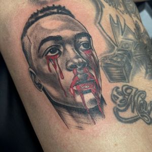 Black & Grey + Horror face tattoo on Upper Arm by Redtats on TattMe