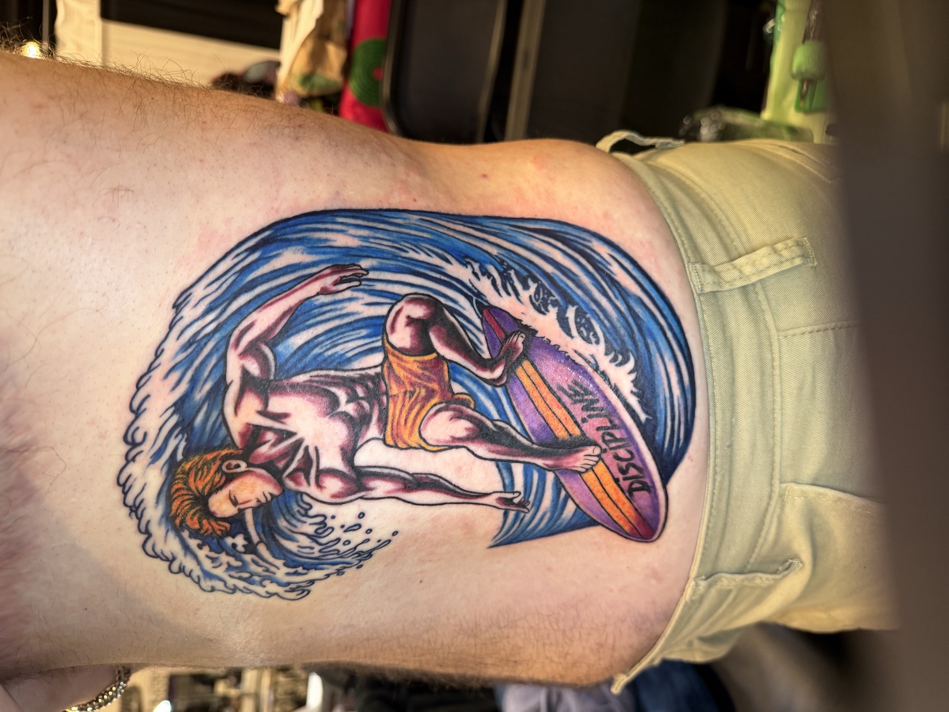 Color + New School surfer tattoo on Ribs by Kiwi on TattMe