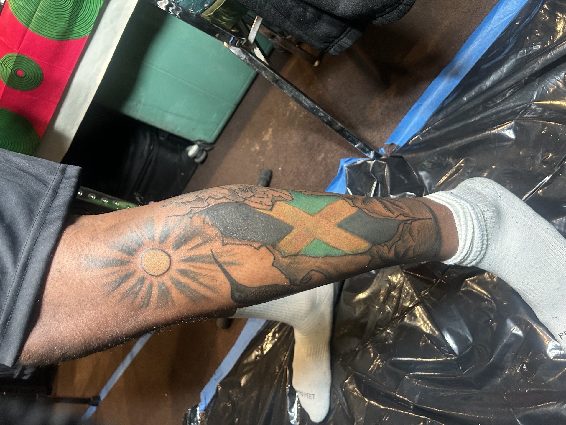 Illustrative + Color sun tattoo on Calf by Kiwi on TattMe