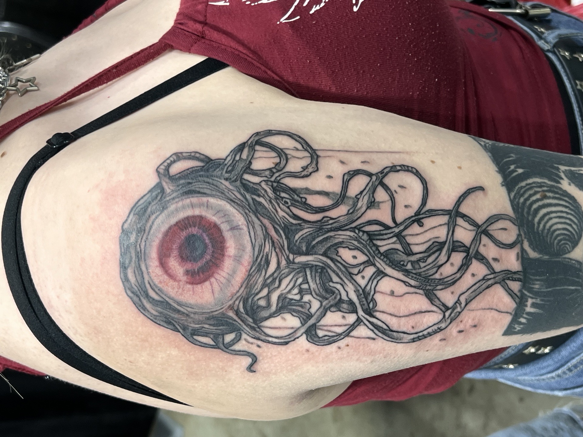 Realism + Black & Grey eyeball tattoo on Upper Arm by Kiwi on TattMe