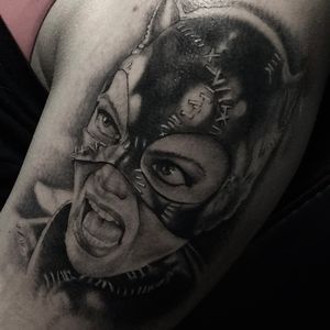 Black & Grey catwoman portrait tattoo on Upper Arm by Tattoos_By_Danny_Cruz on TattMe