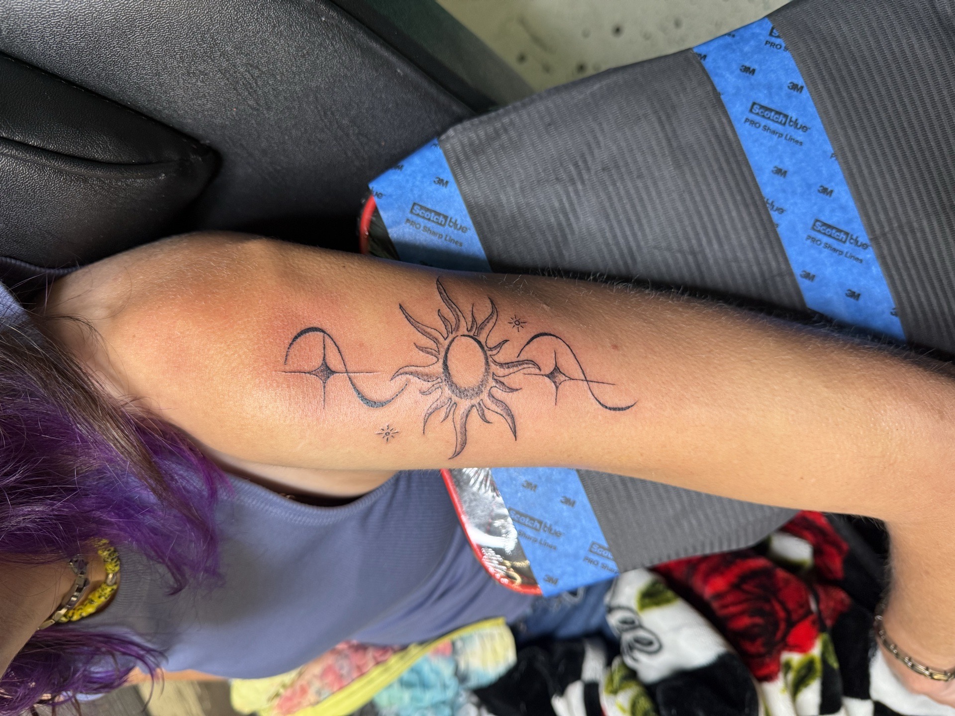 Fine Line + Black-work sun tattoo on Forearm by needleworks_tattoo_studio on TattMe