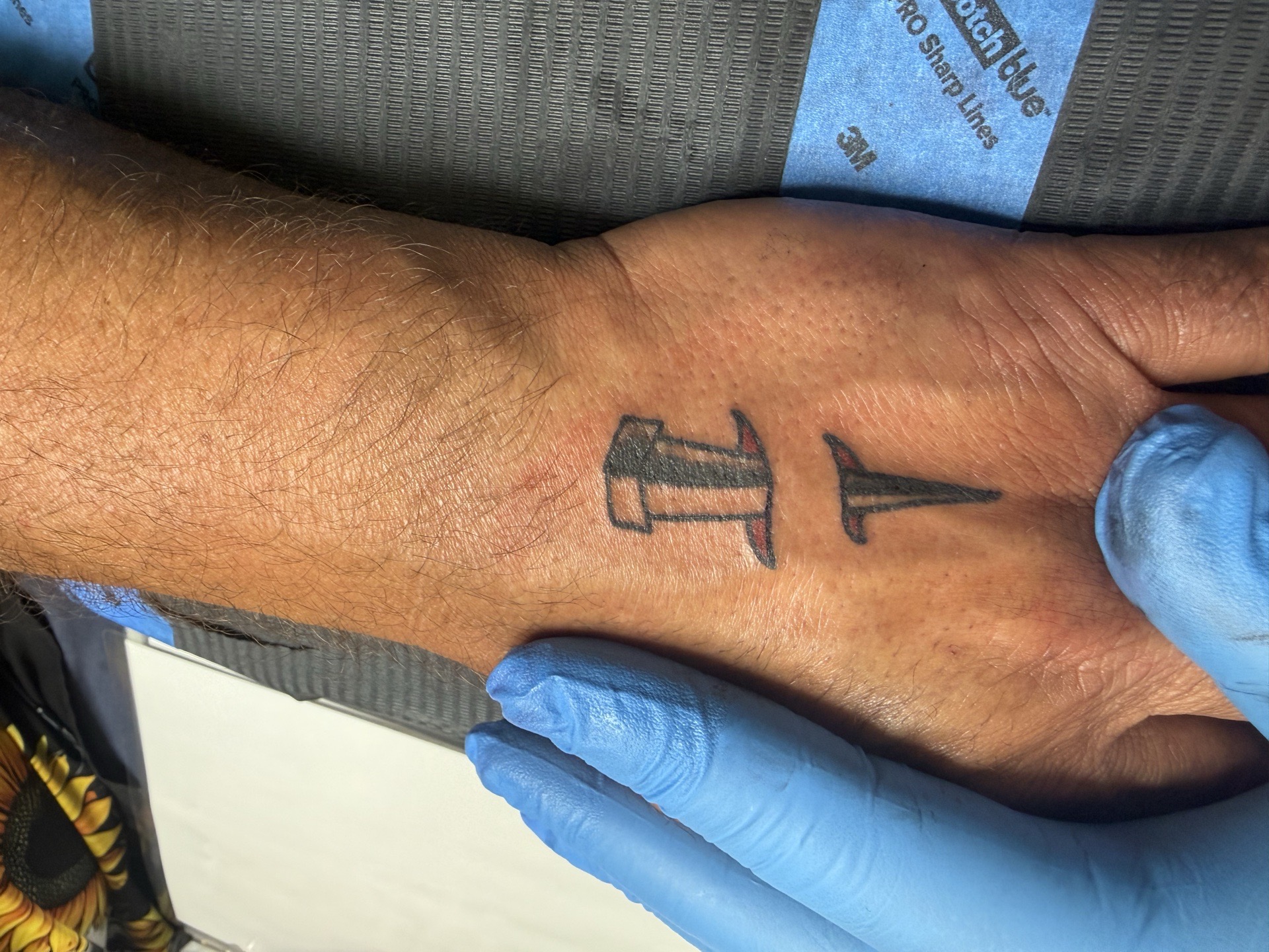 Minimalist + Black-work pushpin tattoo on Hand by needleworks_tattoo_studio on TattMe