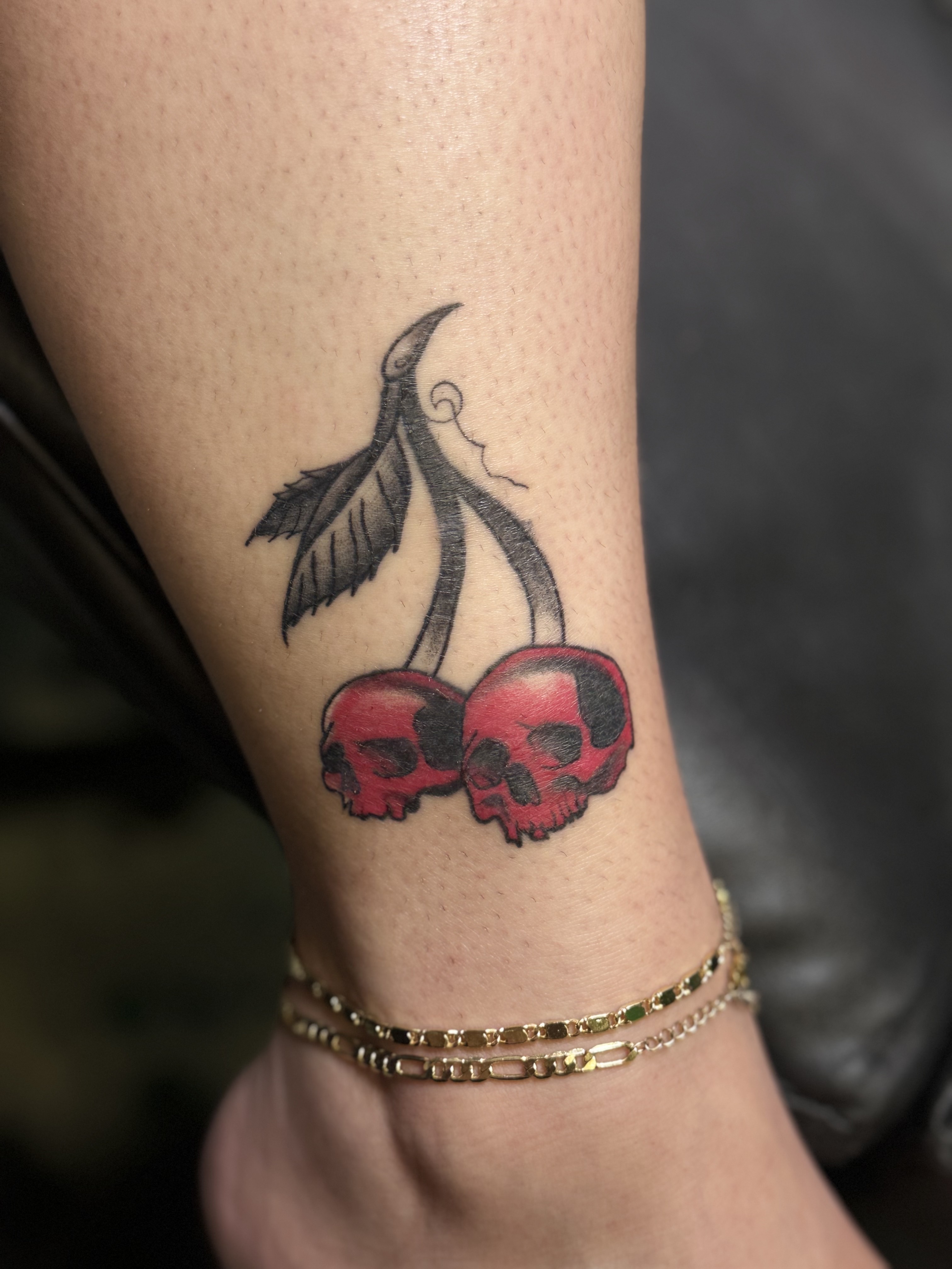Neo-Traditional cherry skulls tattoo by needleworks_tattoo_studio on TattMe
