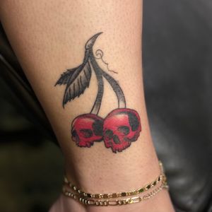 Neo-Traditional cherry skulls tattoo by needleworks_tattoo_studio on TattMe