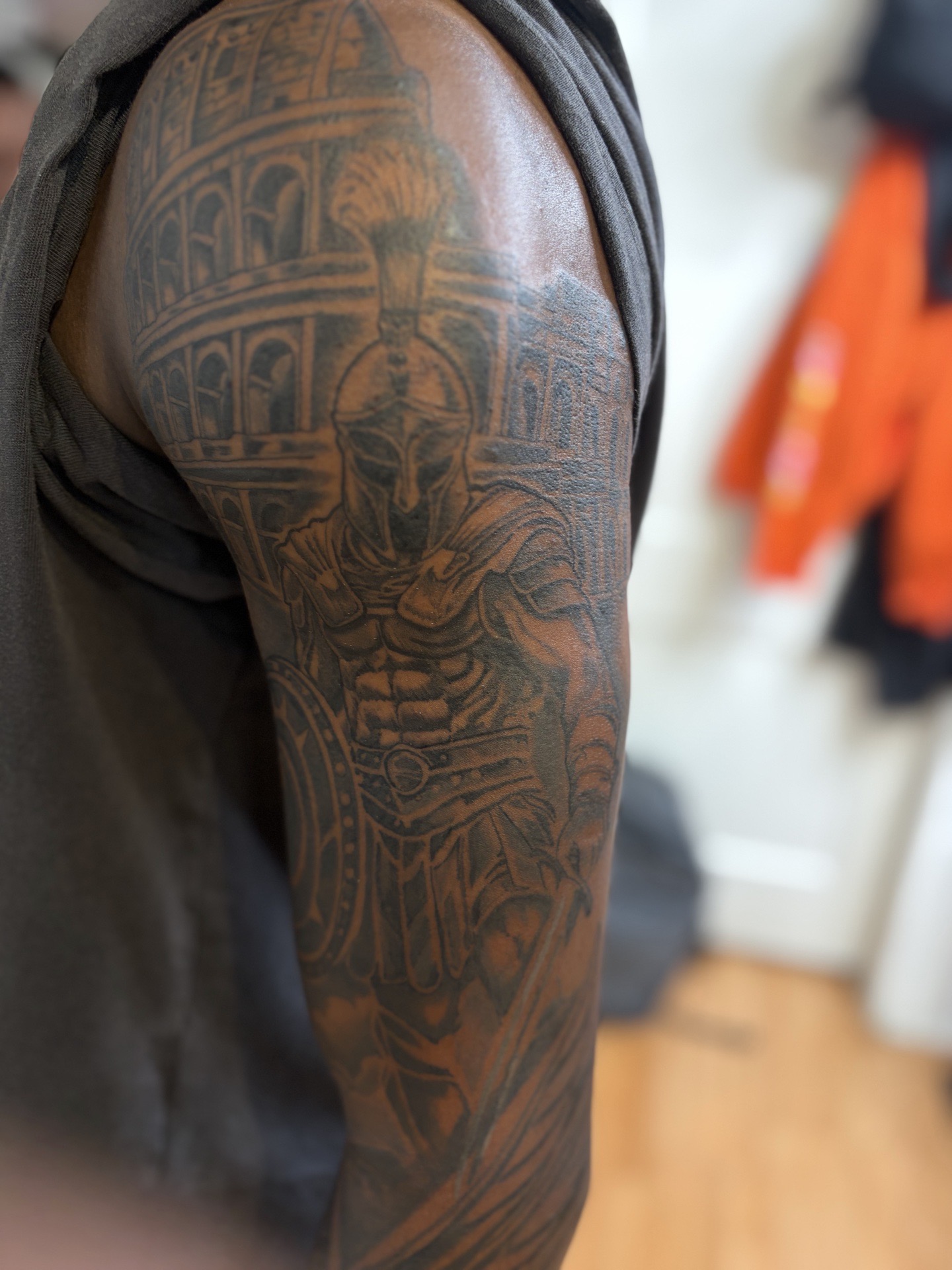 Black & Grey + Illustrative warrior tattoo on Upper Arm by tattoogoonz on TattMe