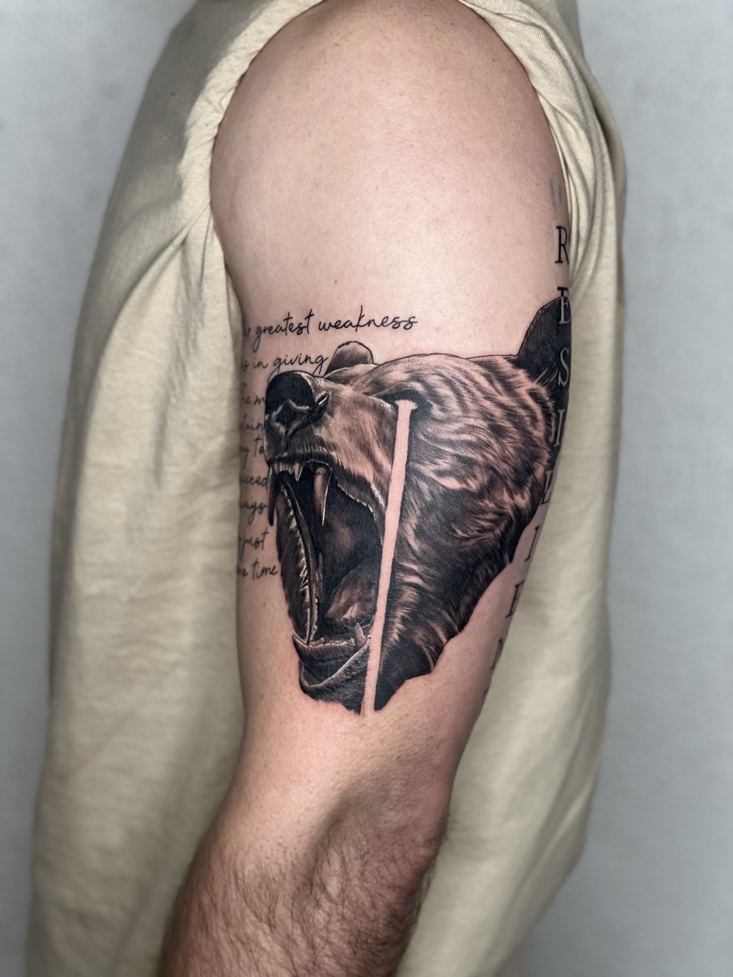Black & Grey + Realism bear tattoo on Upper Arm by tattoogoonz on TattMe