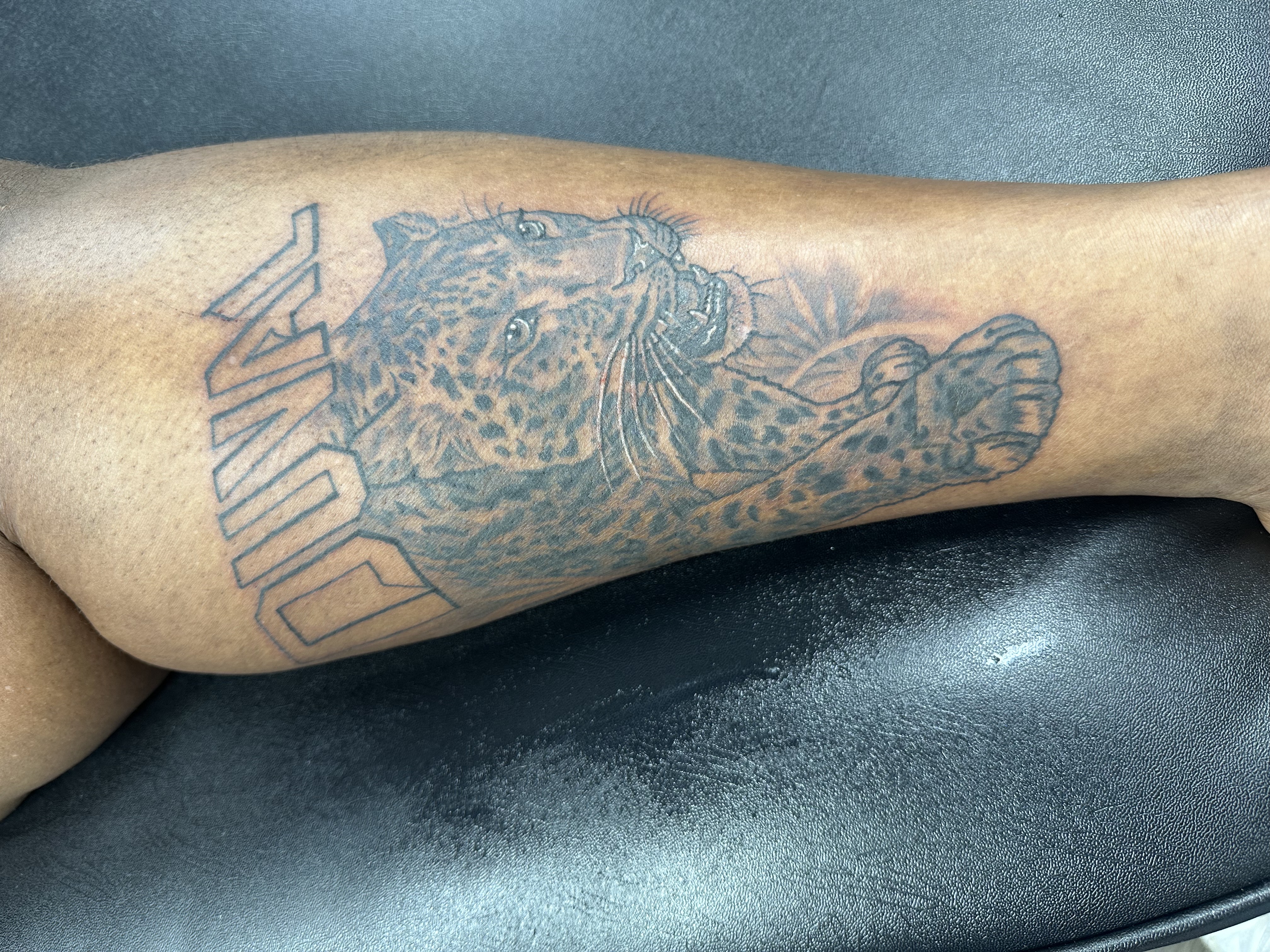 Black & Grey + Lettering leopard tattoo on Calf by LameDoingTatts on TattMe