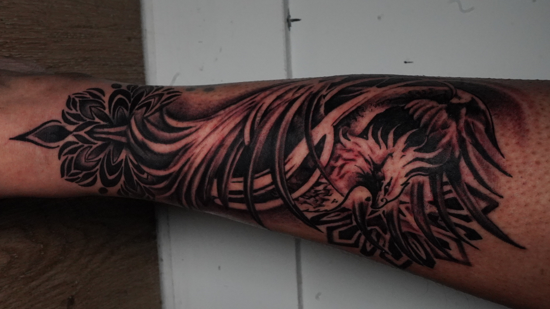 Surrealism + Black & Grey pheonix tattoo on Shin by TATMANERC on TattMe