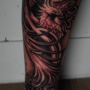 Surrealism + Black & Grey pheonix tattoo on Shin by TATMANERC on TattMe