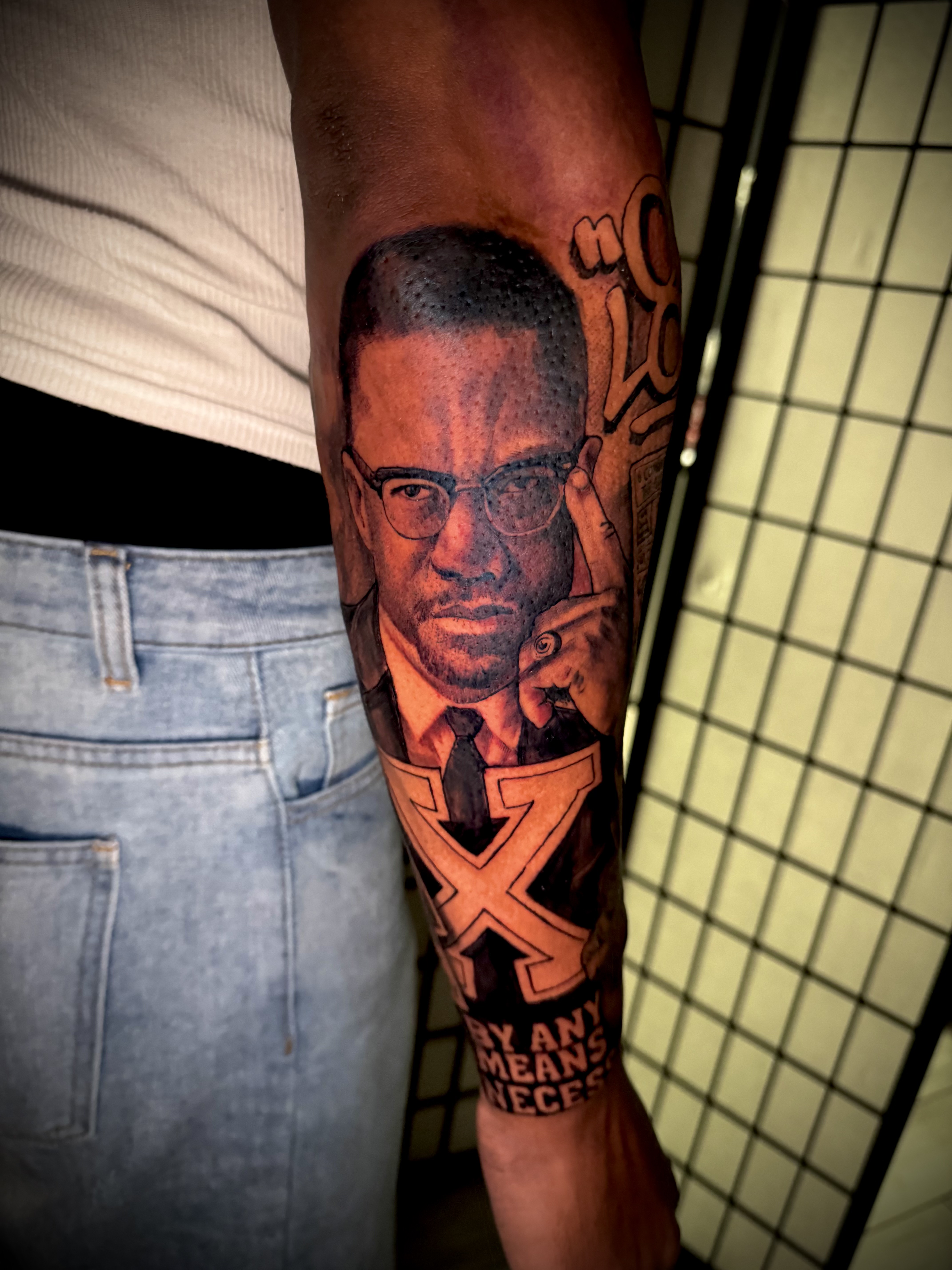 Realism + Portrait malcolm x tattoo on Forearm by DTXIII on TattMe