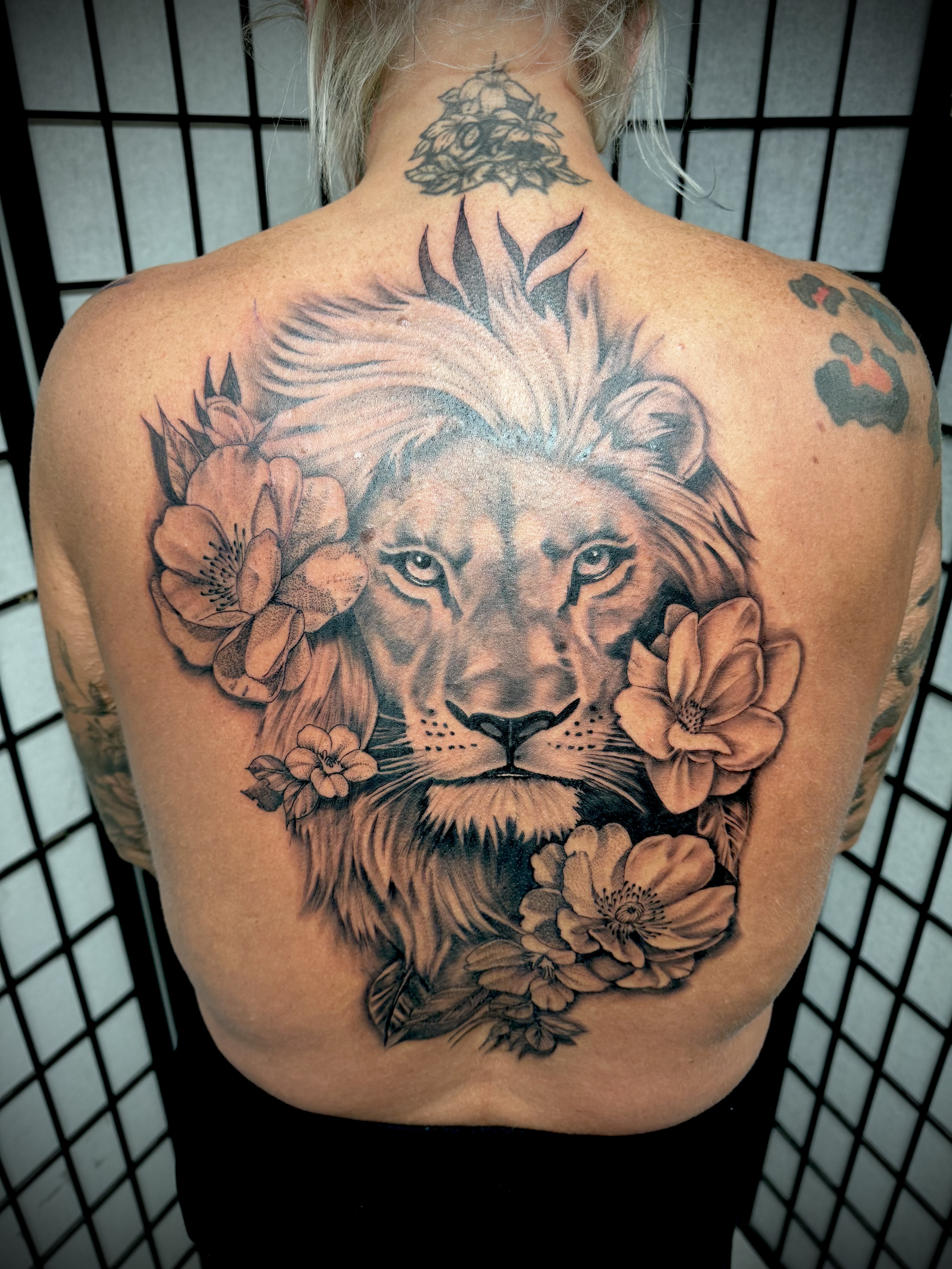 Black & Grey + Realism lion tattoo on Upper Back by DTXIII on TattMe