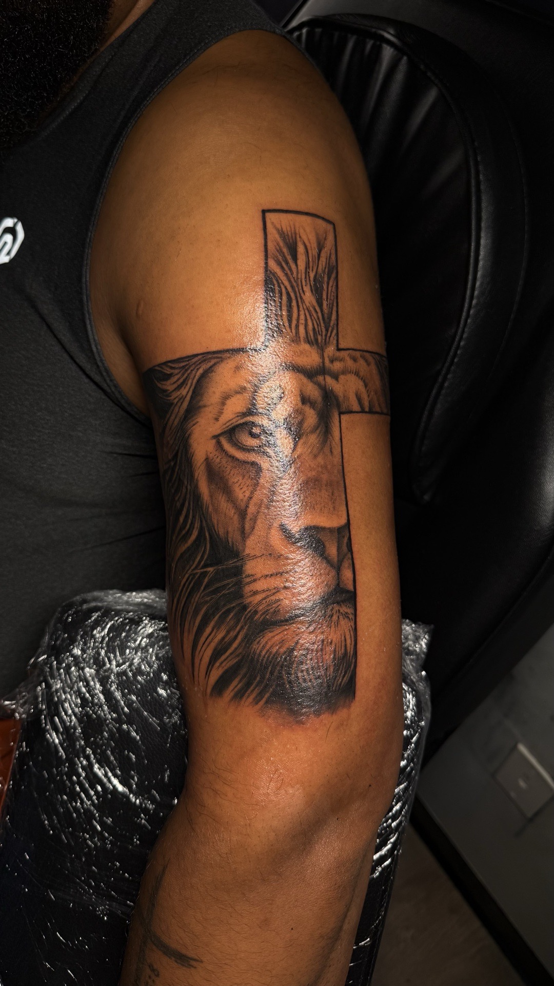 Black & Grey + Realism lion tattoo on Upper Arm by tattoo.banditt on TattMe
