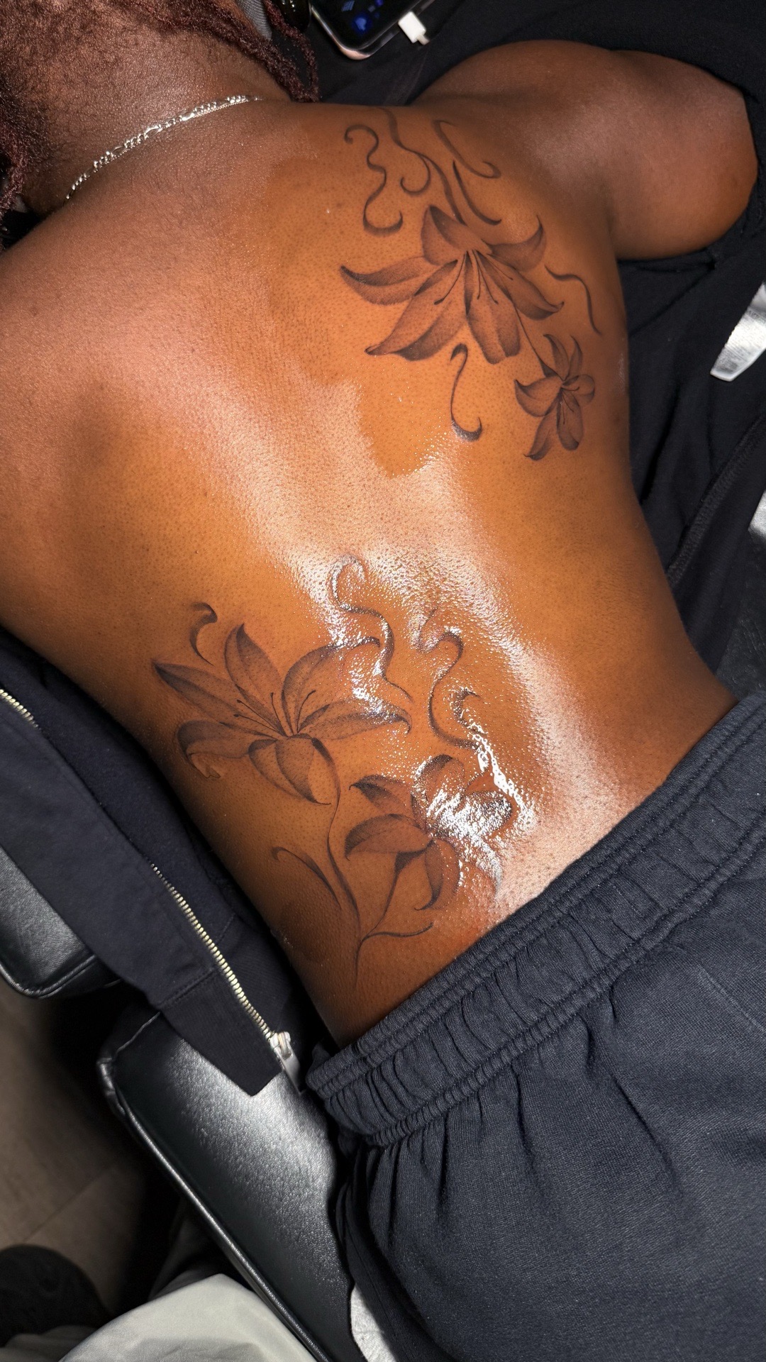 Floral + Black & Grey flowers tattoo on Upper Back by tattoo.banditt on TattMe