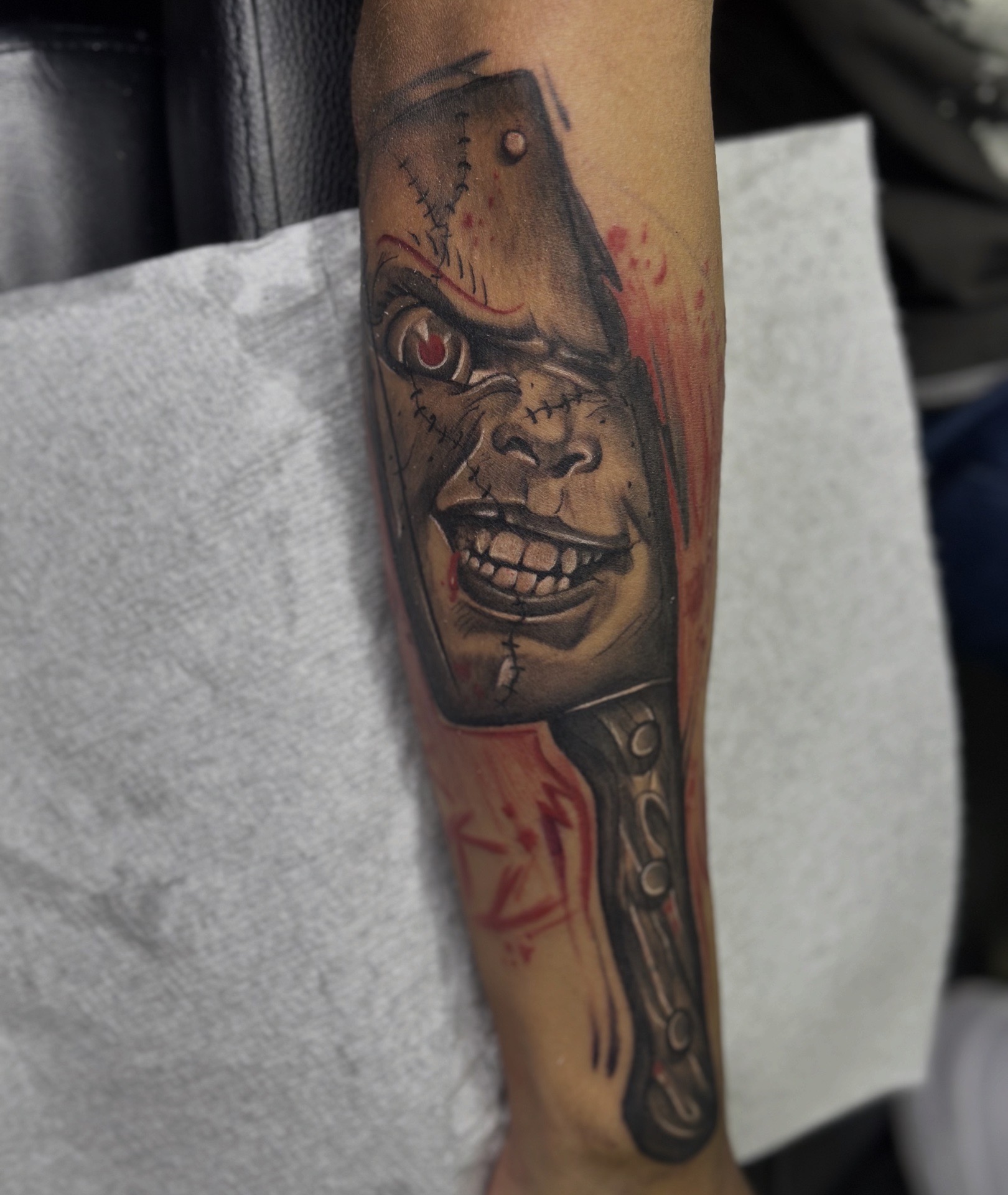Black & Grey + Realism chucky tattoo on Forearm by 100inkz on TattMe
